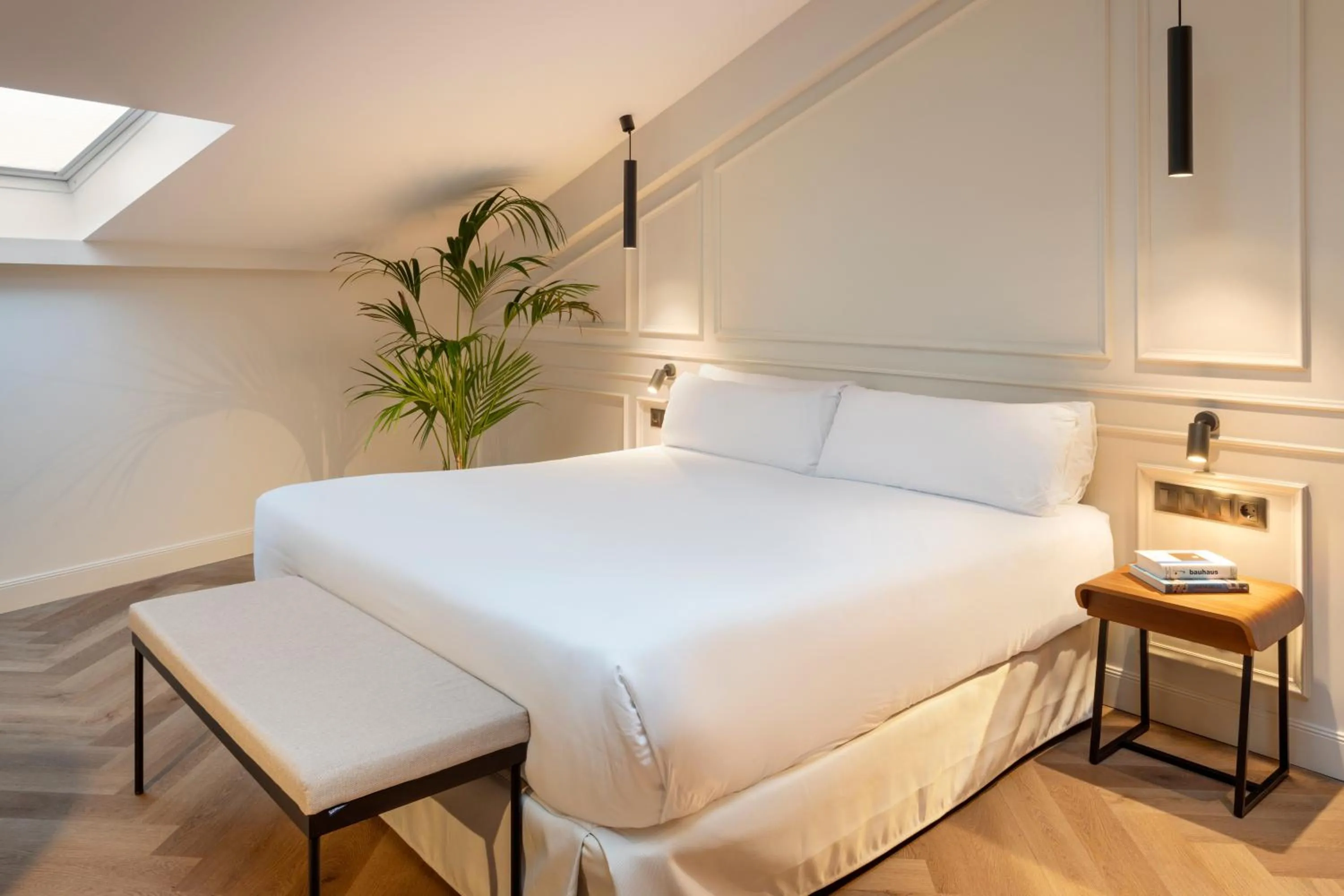 Bed in Bilder Boutique Hotel
