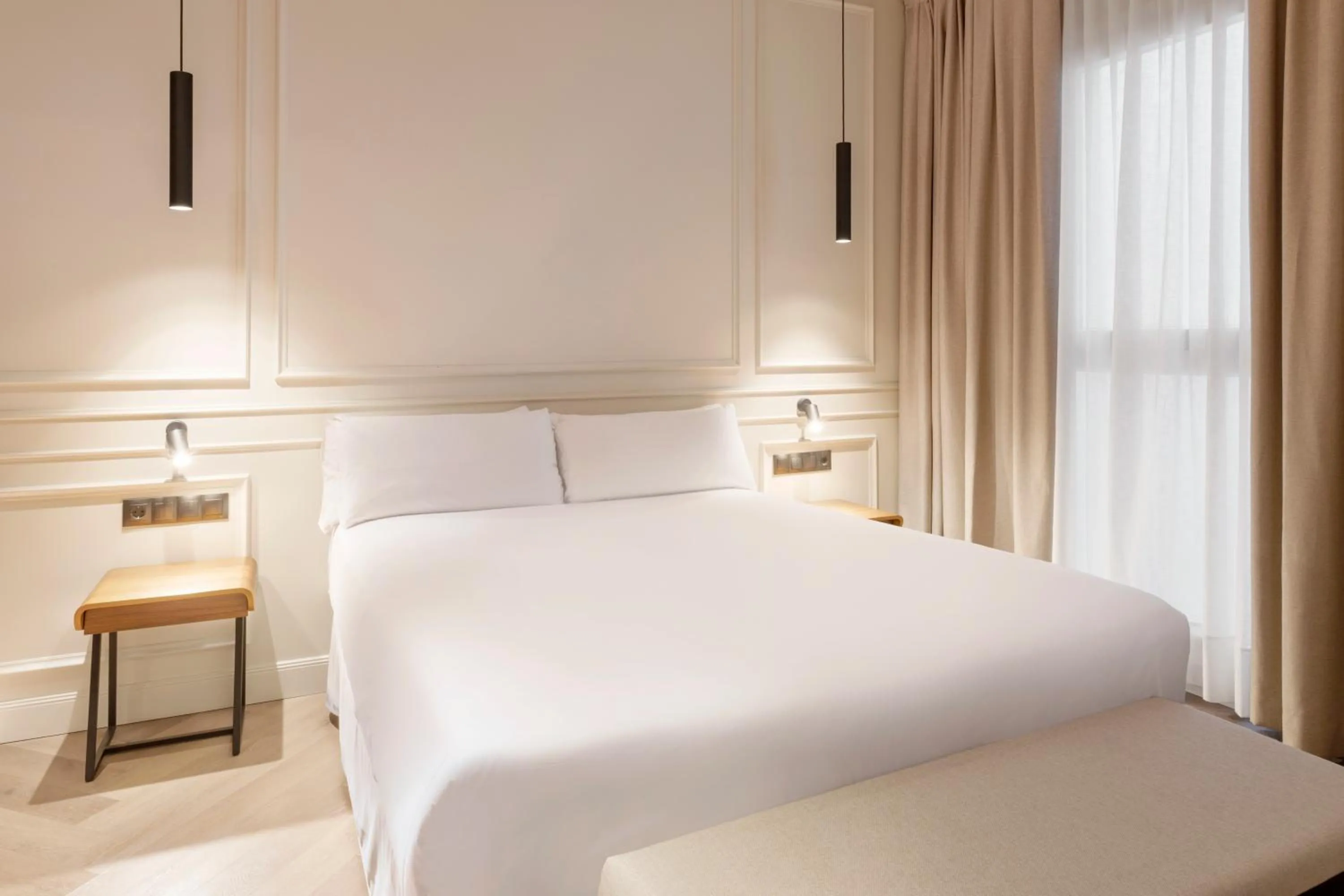 Bed in Bilder Boutique Hotel