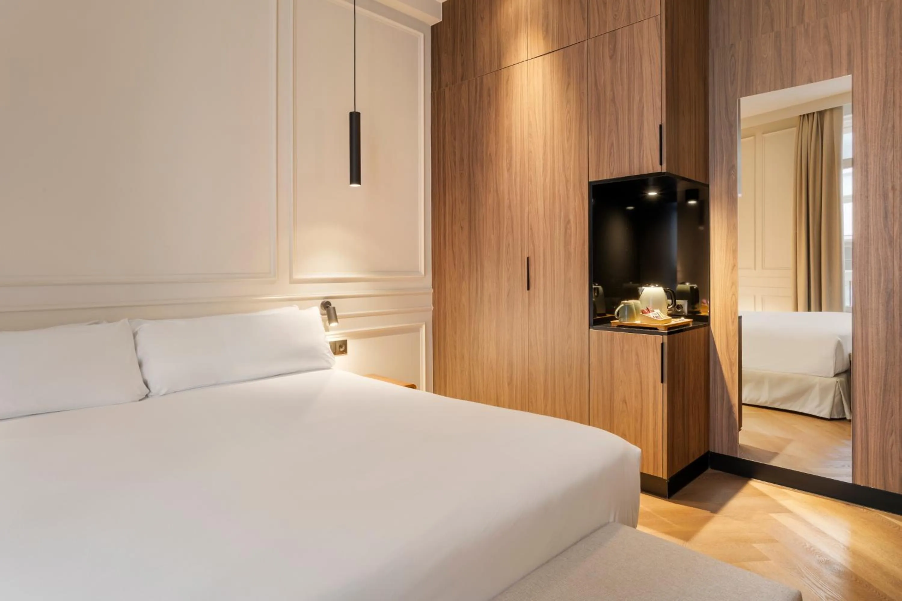 Bed in Bilder Boutique Hotel