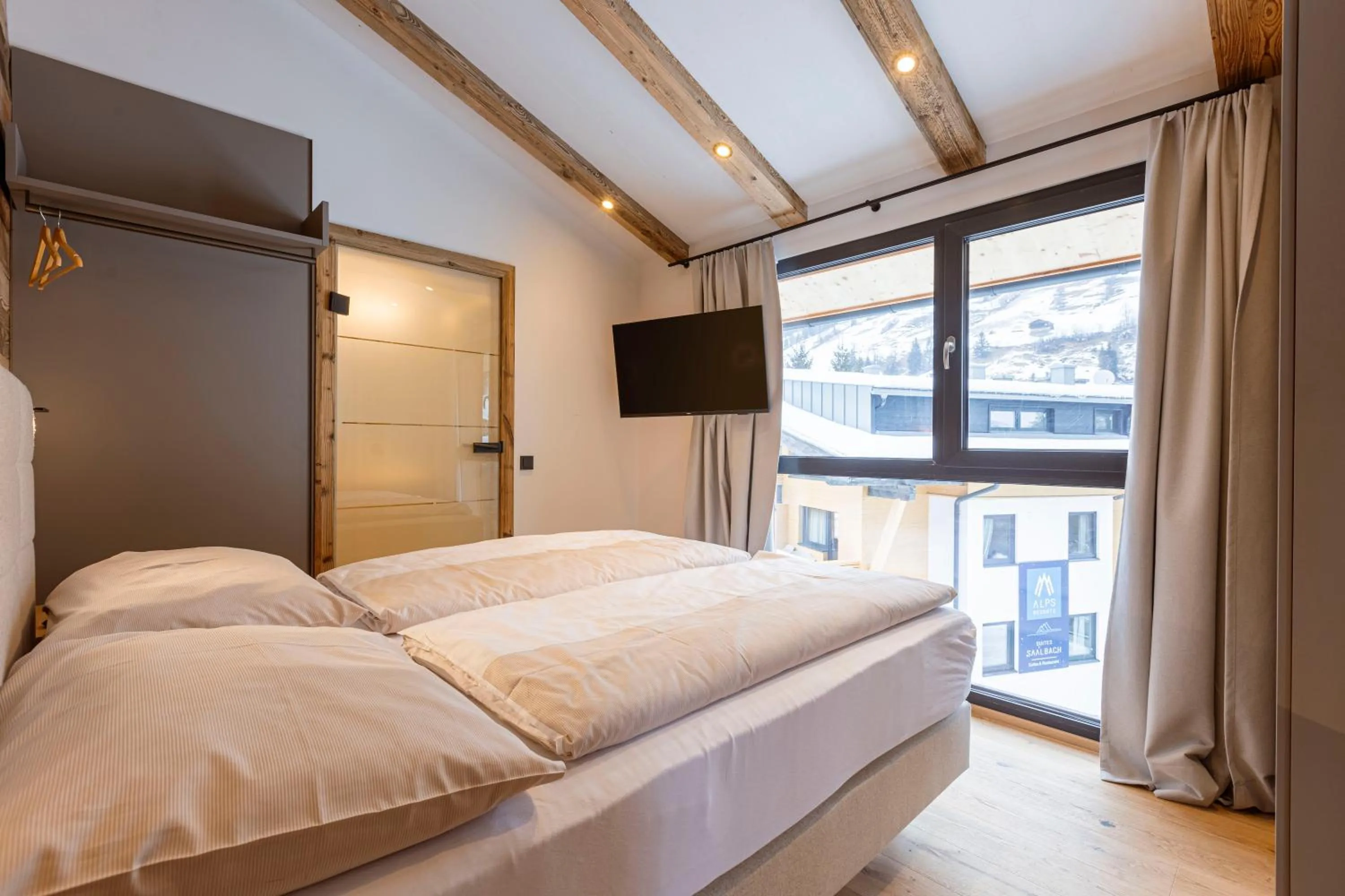 Bedroom, Bed in Saalbach Suites by ALPS RESORTS