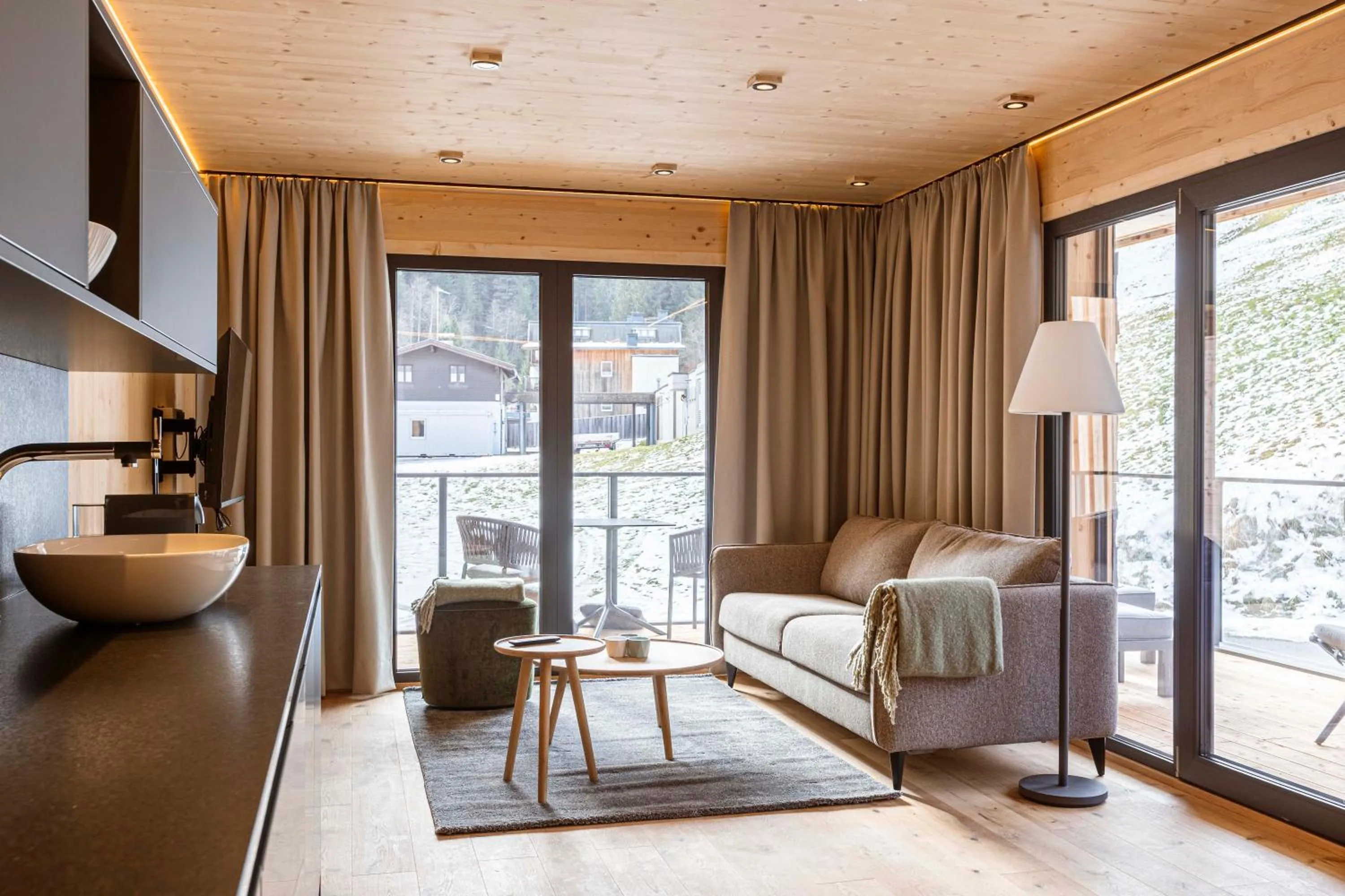 Living room in Saalbach Suites by ALPS RESORTS