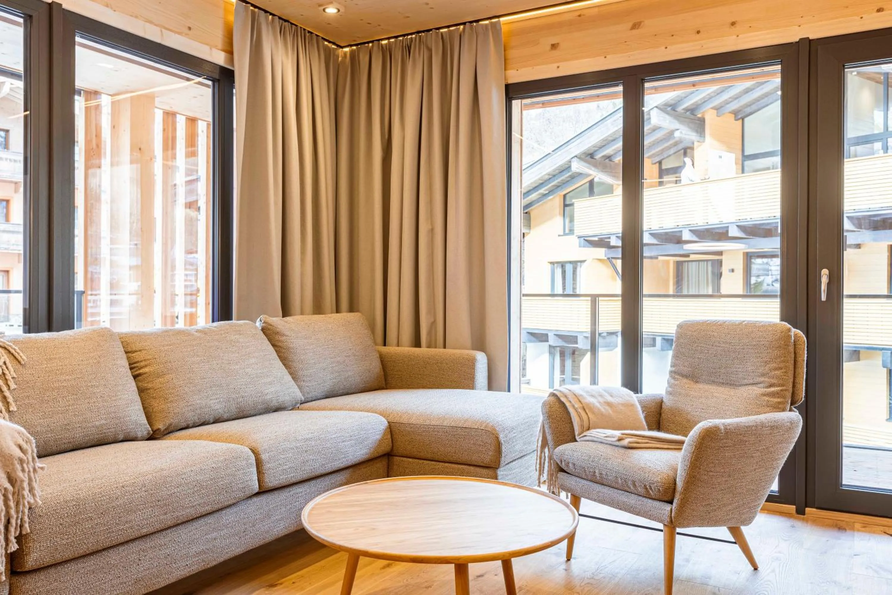 Living room in Saalbach Suites by ALPS RESORTS