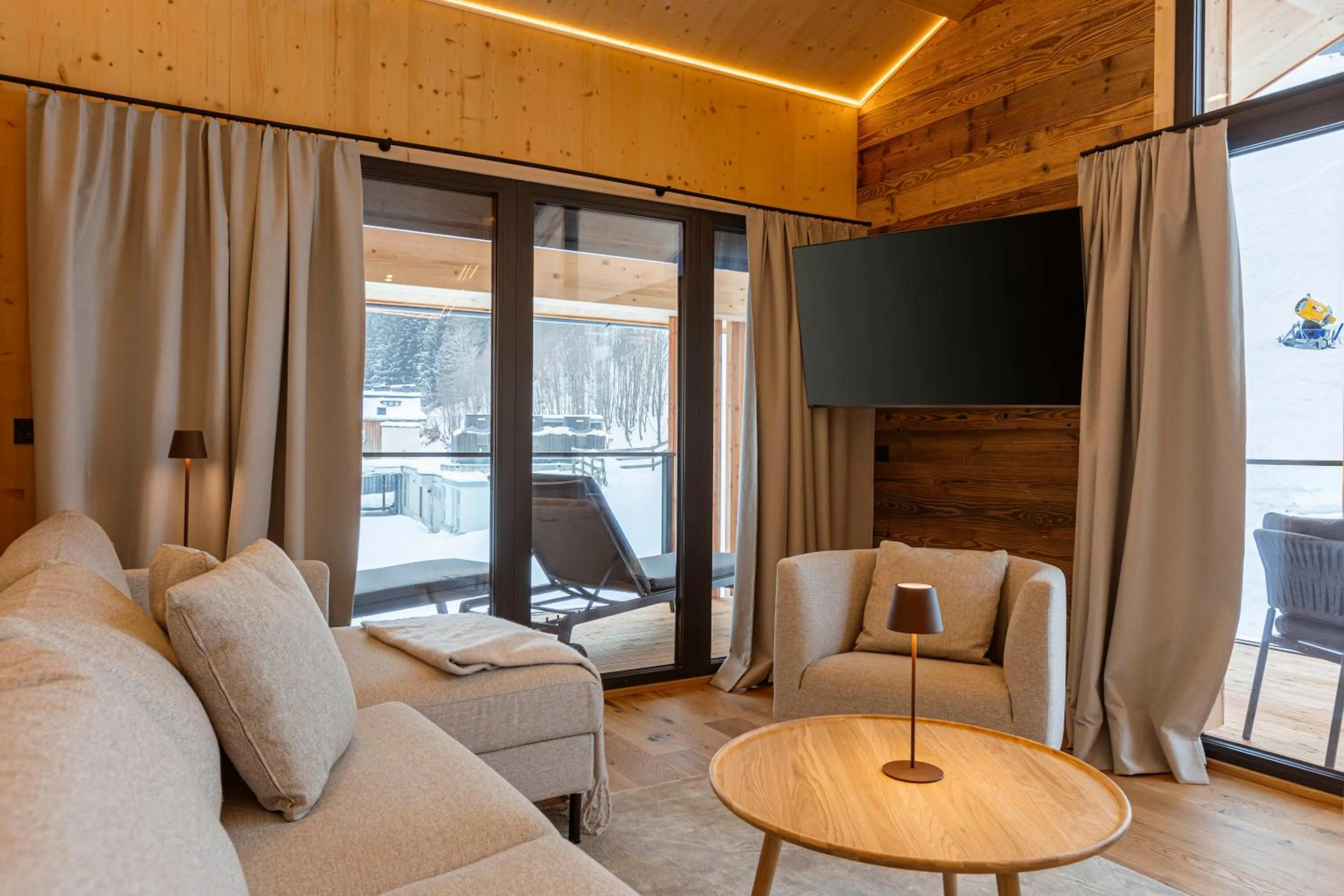 Living room in Saalbach Suites by ALPS RESORTS