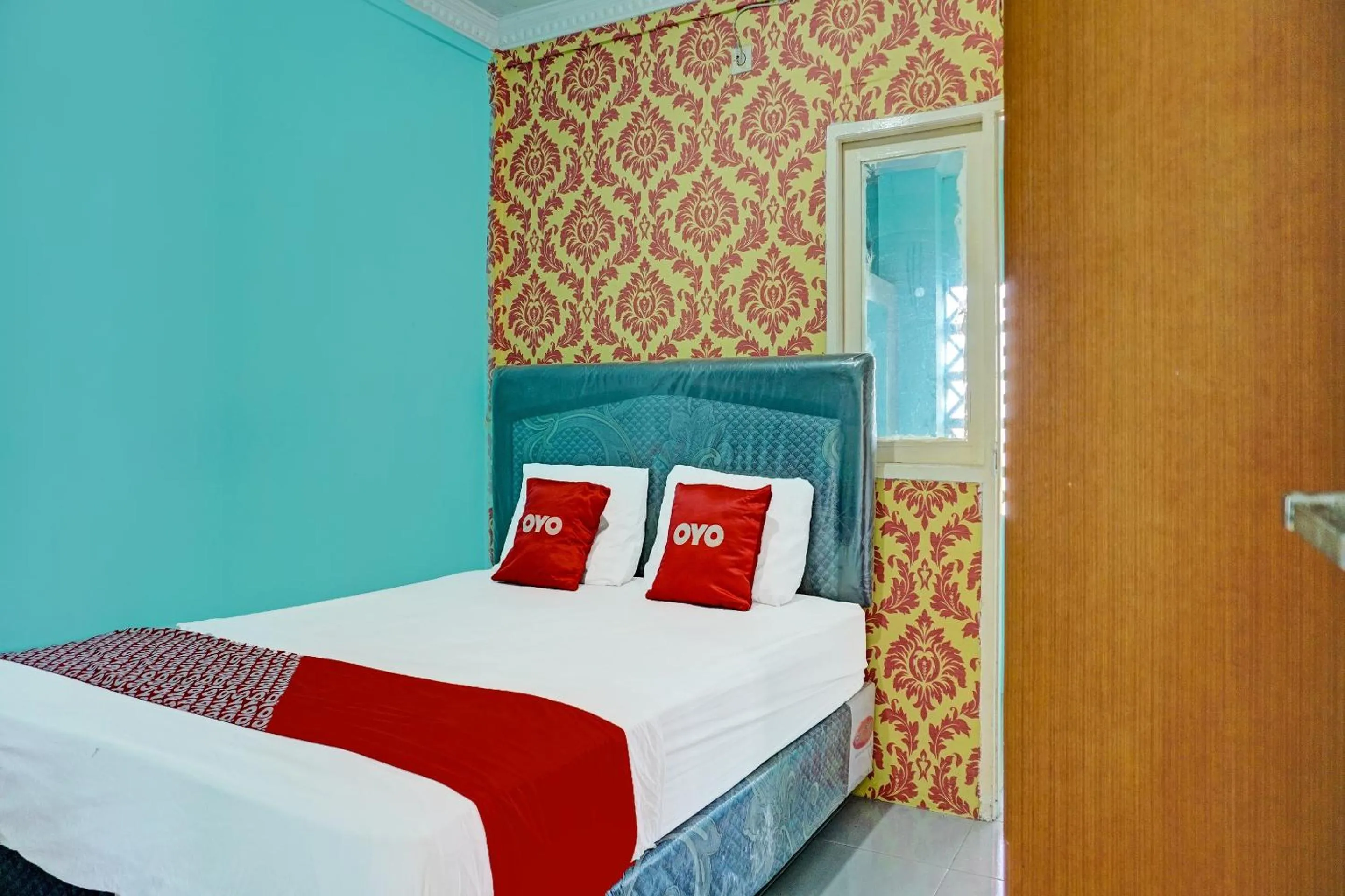 Bedroom, Bed in Hotel O Home Stay Elis Cateliya Syariah