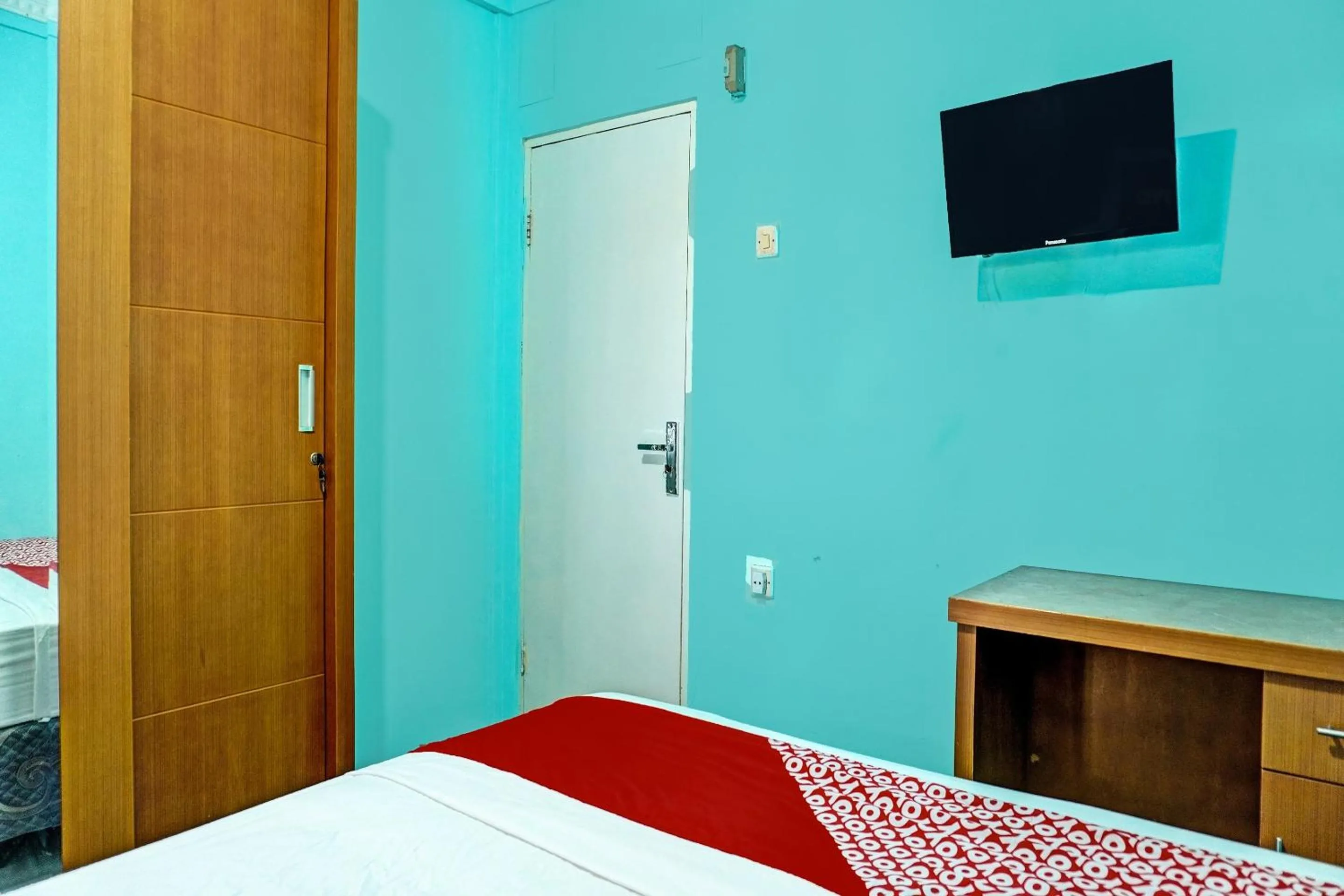Bedroom, Bed in Hotel O Home Stay Elis Cateliya Syariah