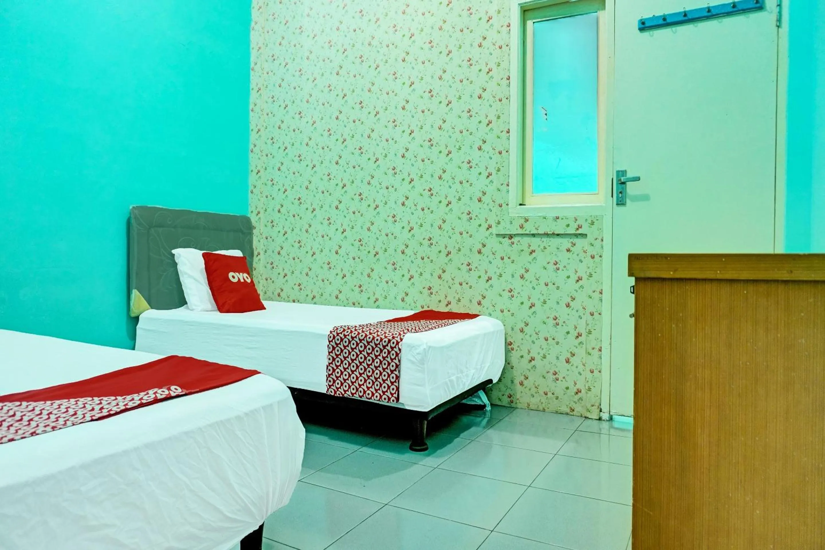 Bedroom, Bed in Hotel O Home Stay Elis Cateliya Syariah