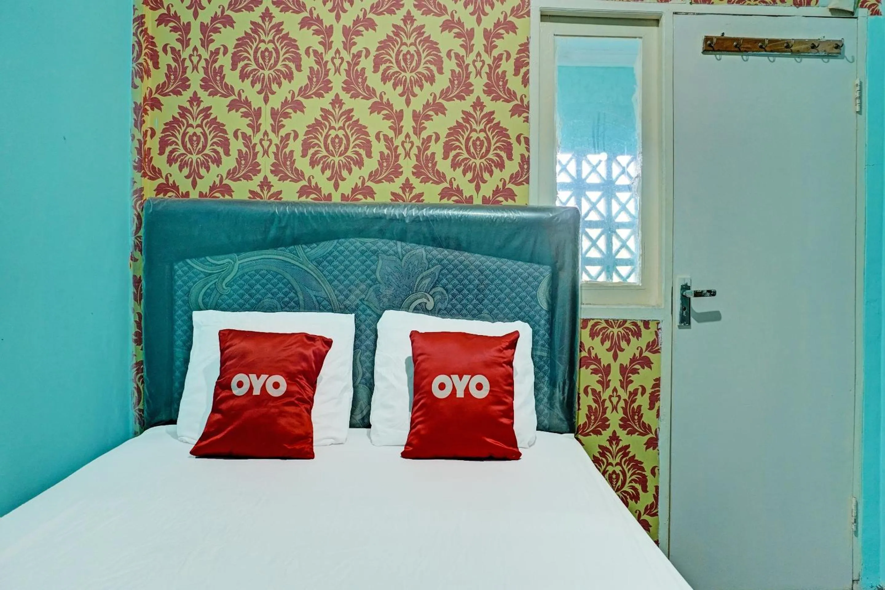 Bedroom, Bed in Hotel O Home Stay Elis Cateliya Syariah