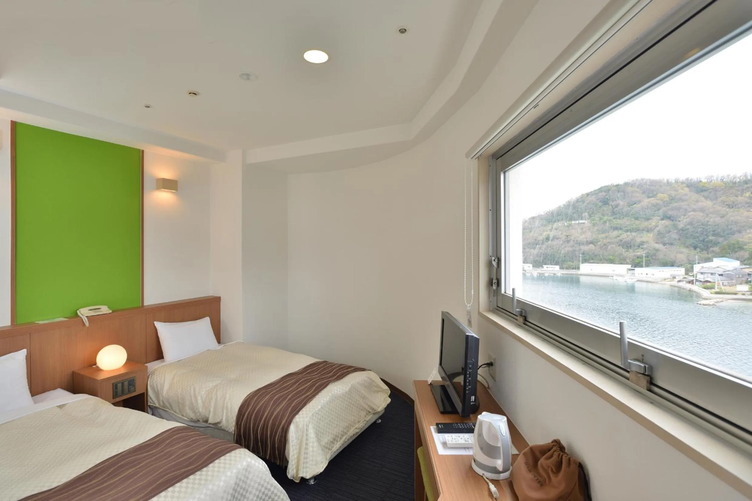 Photo of the whole room, Bed in Bay Resort Hotel Shodoshima