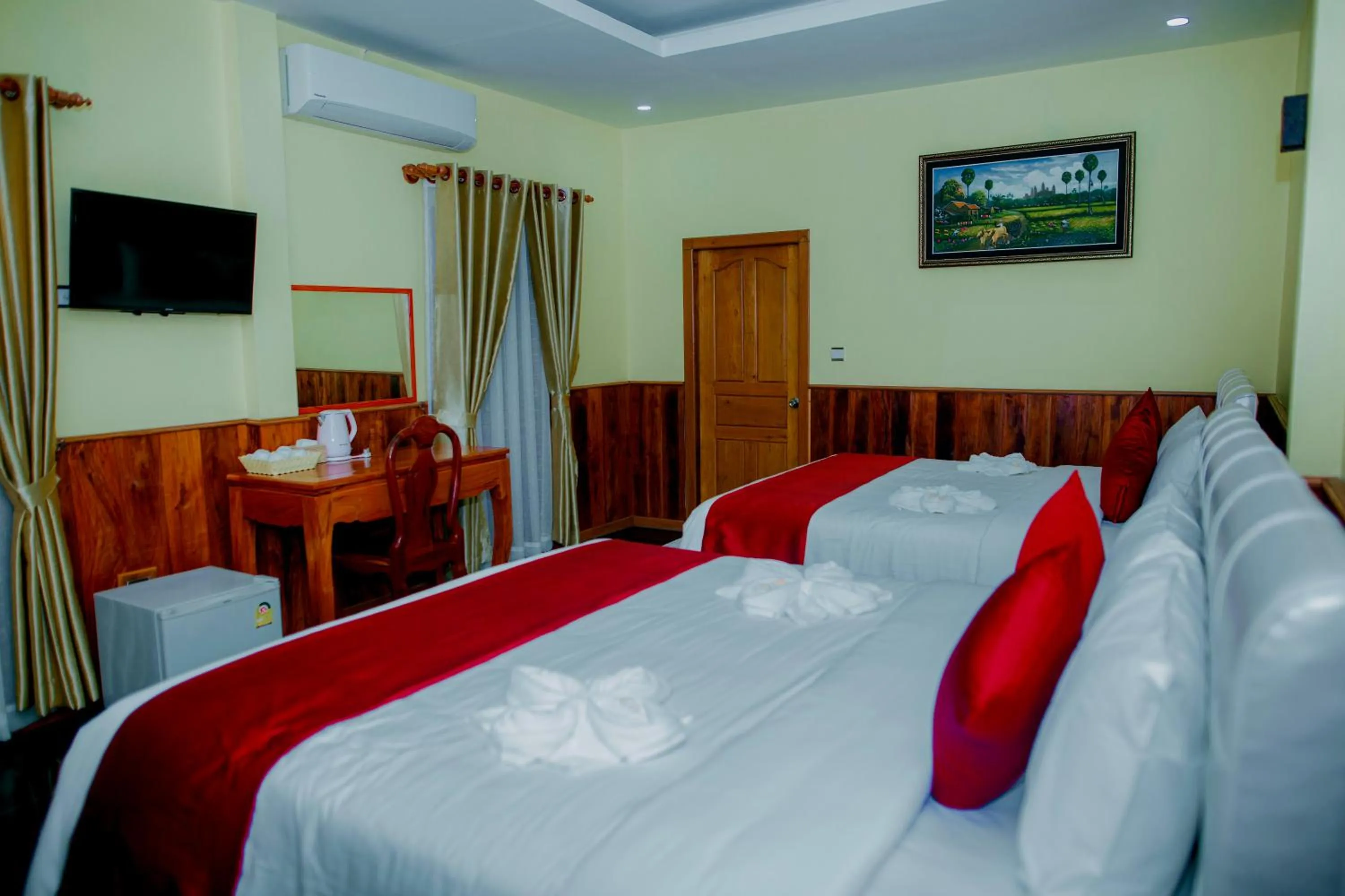 Photo of the whole room, Bed in Mohasal Angkor Boutique