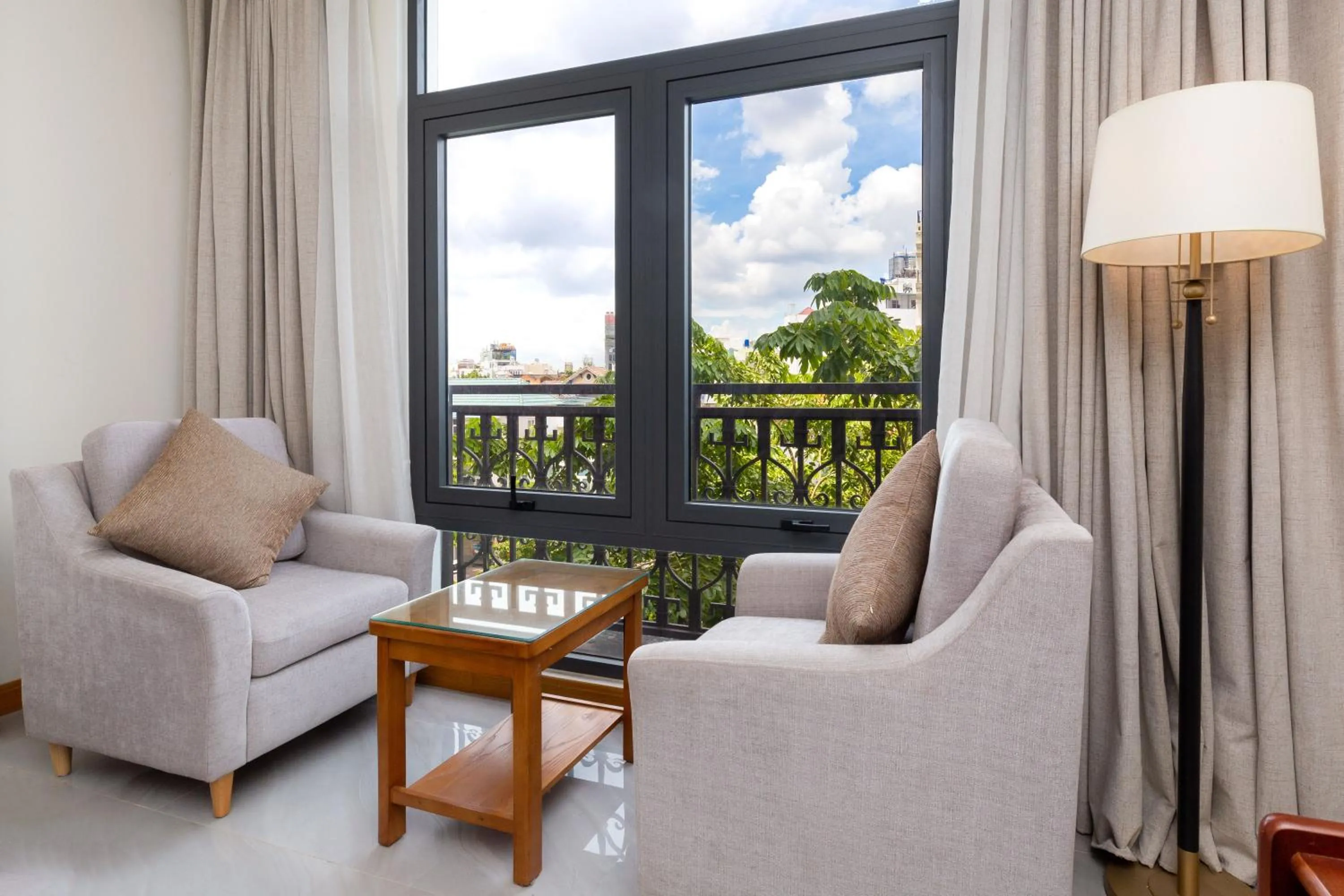 Seating area in Silk Hong Ha airport hotel