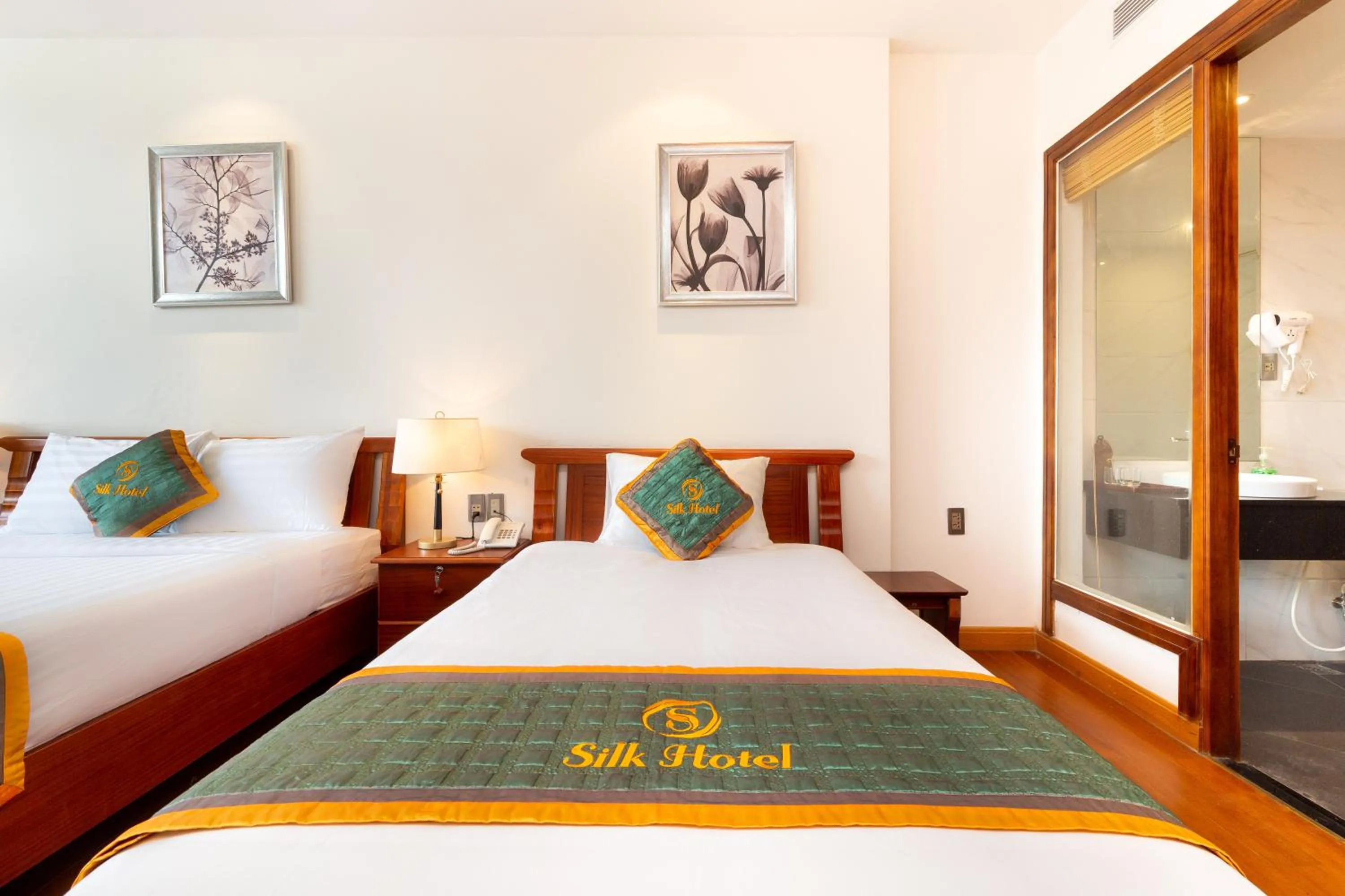 Bed in Silk Hong Ha airport hotel