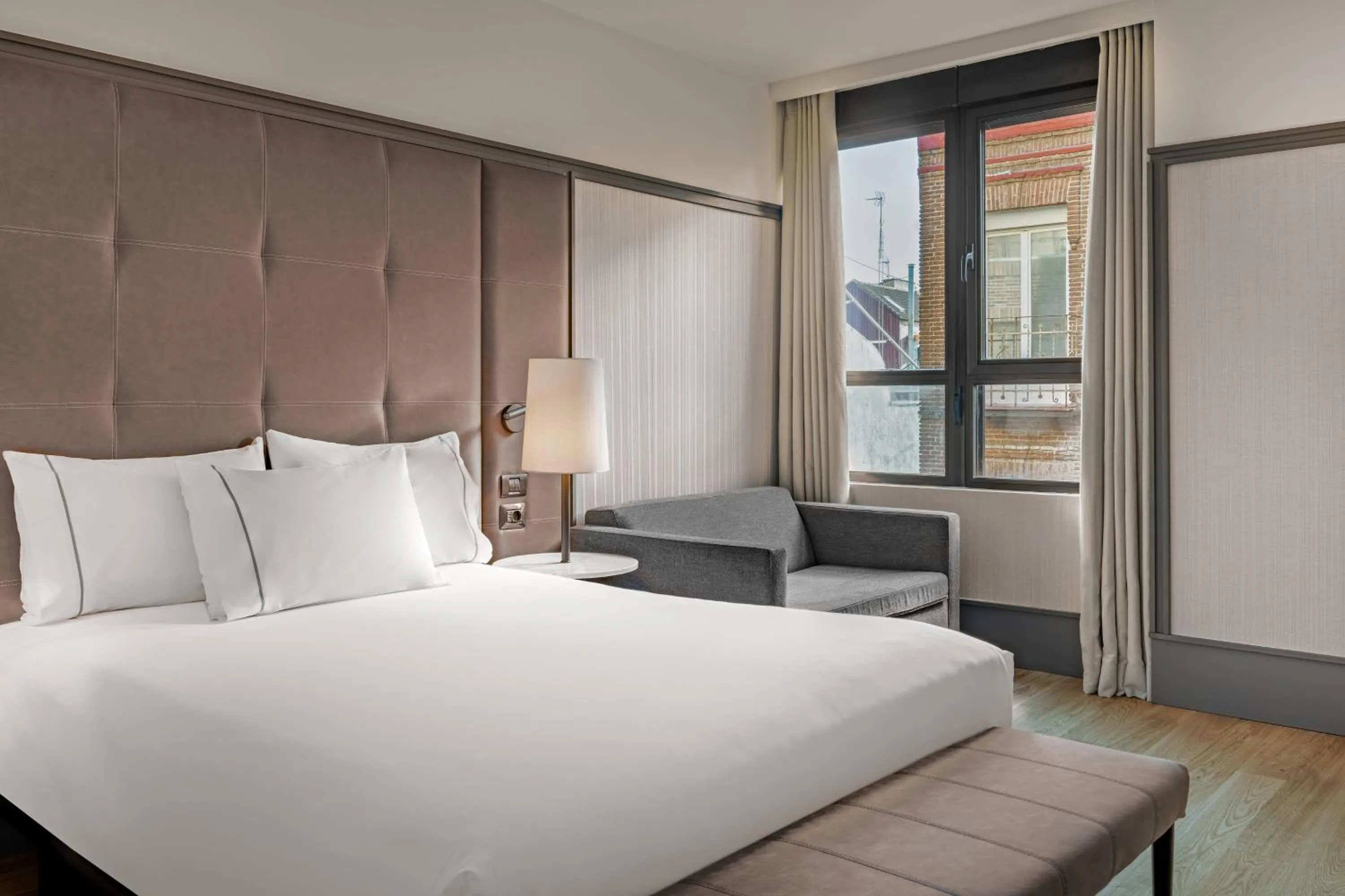 Photo of the whole room, Bed in AC Hotel Avenida de América by Marriott