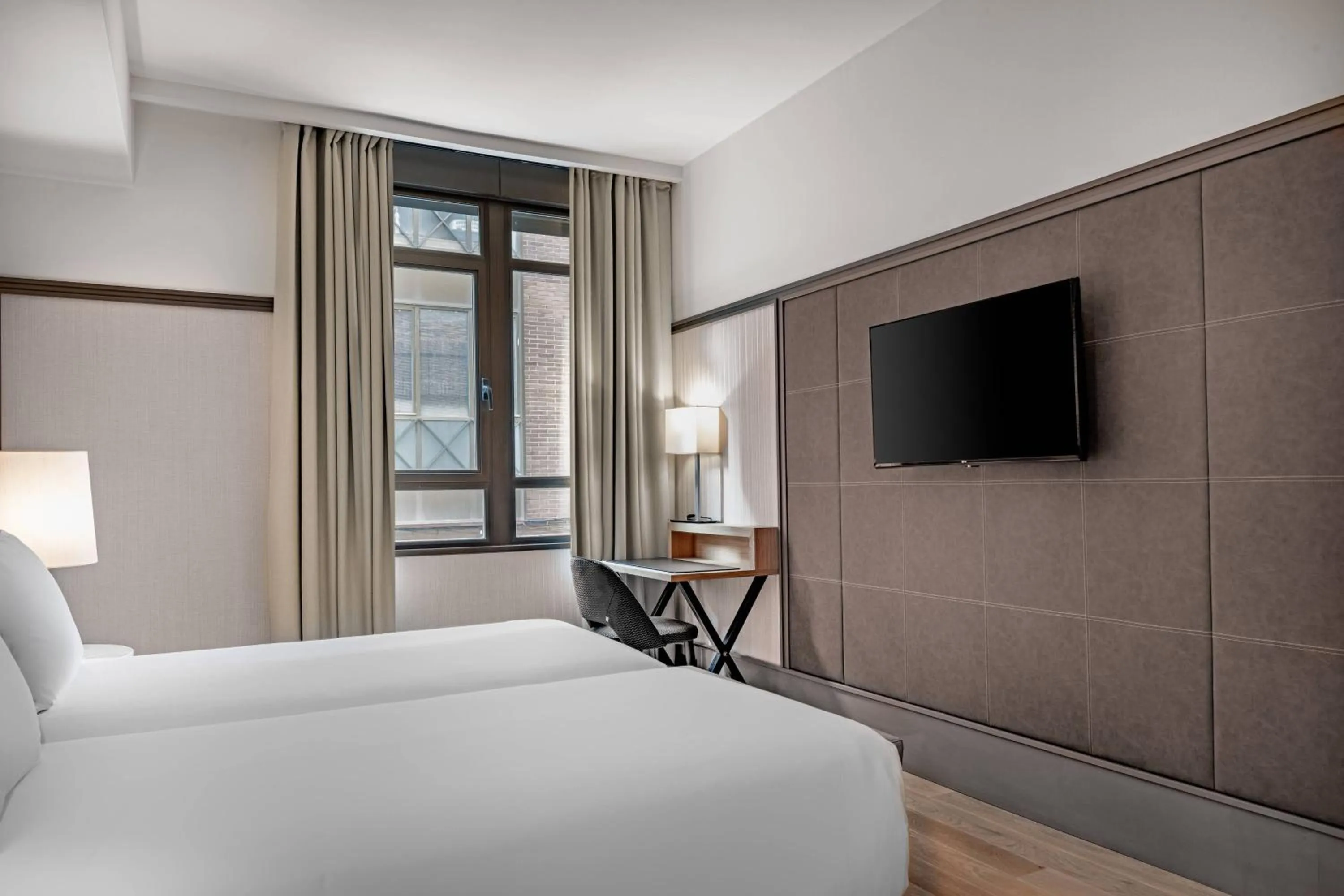 Photo of the whole room, Bed in AC Hotel Avenida de América by Marriott