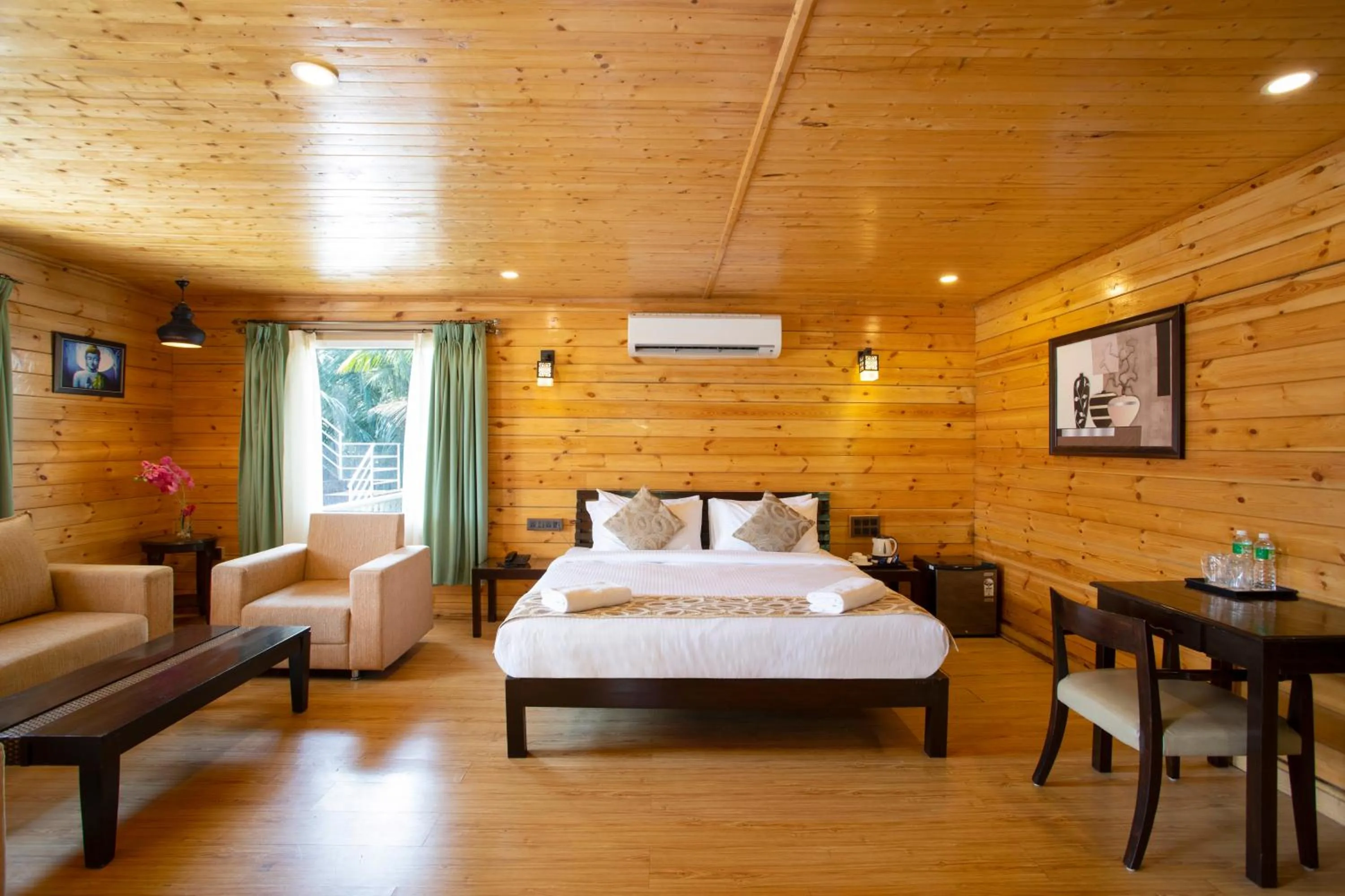 Bed in Stone Wood Riverfront Resort, Siolim