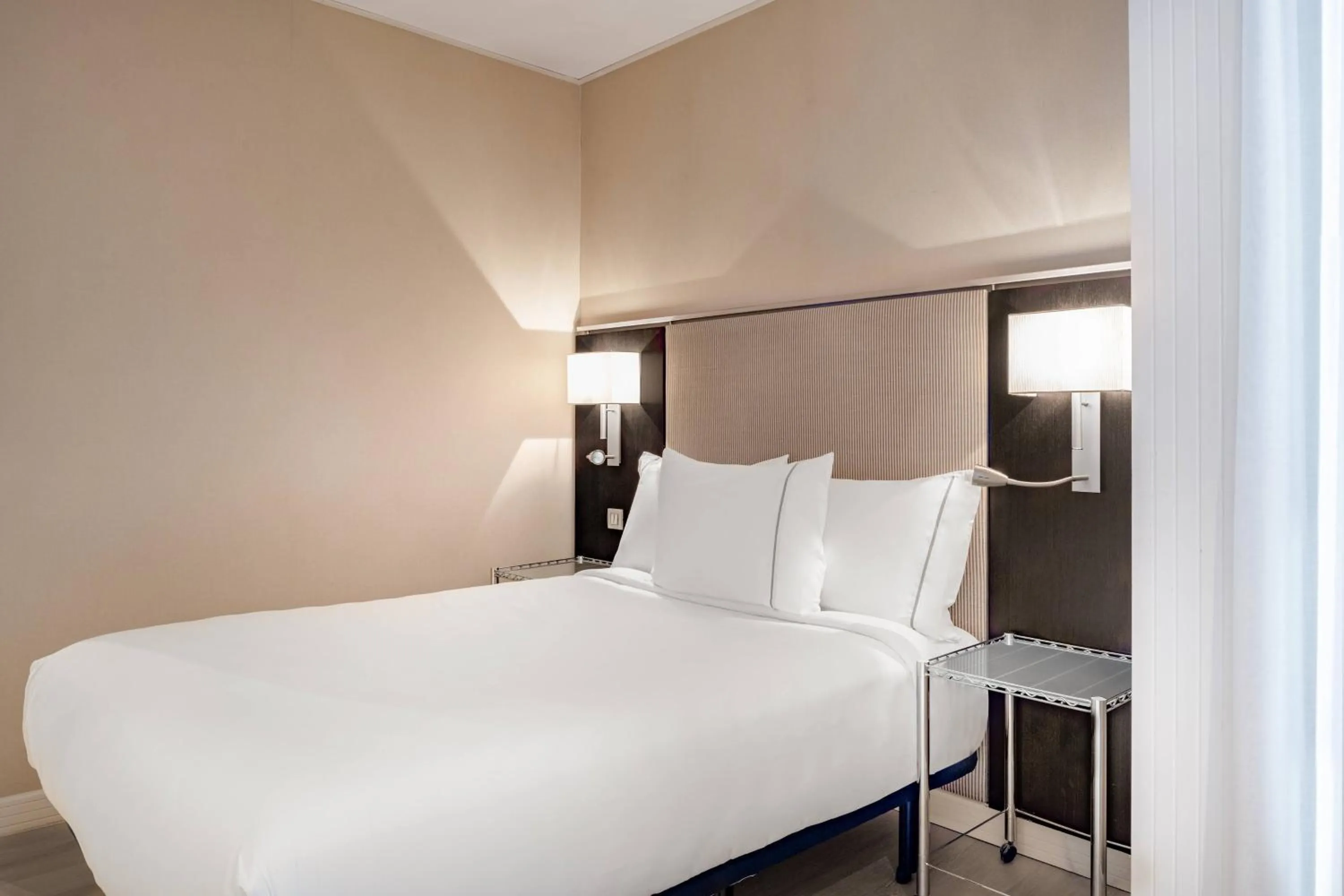 Photo of the whole room, Bed in AC Hotel Irla by Marriott