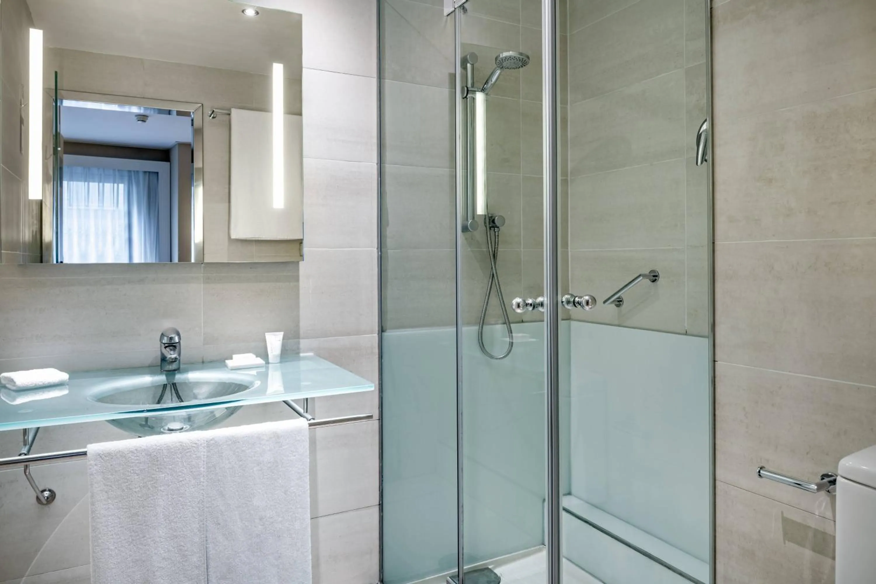 Bathroom in AC Hotel Irla by Marriott