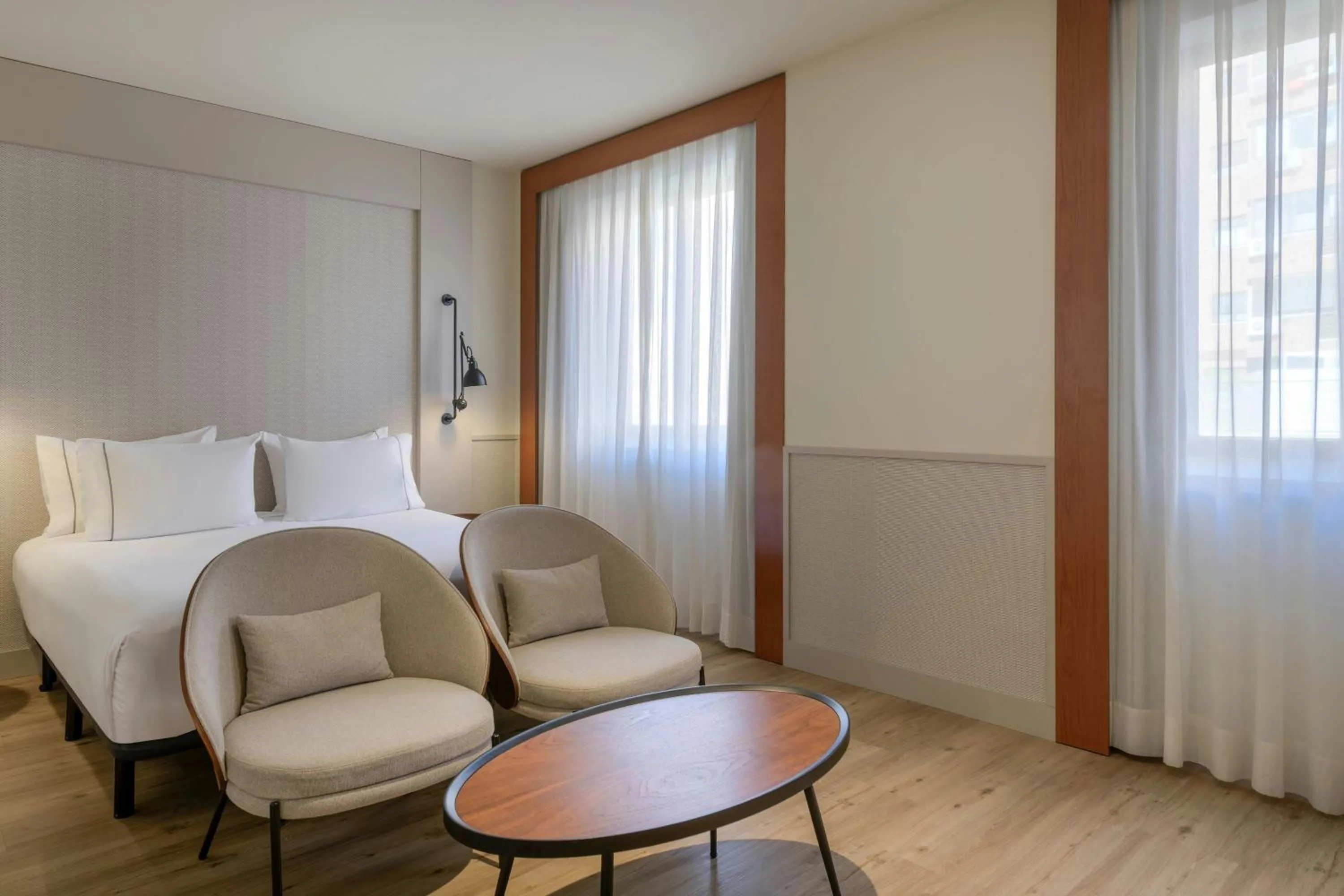 Photo of the whole room, Bed in AC Hotel Los Vascos by Marriott