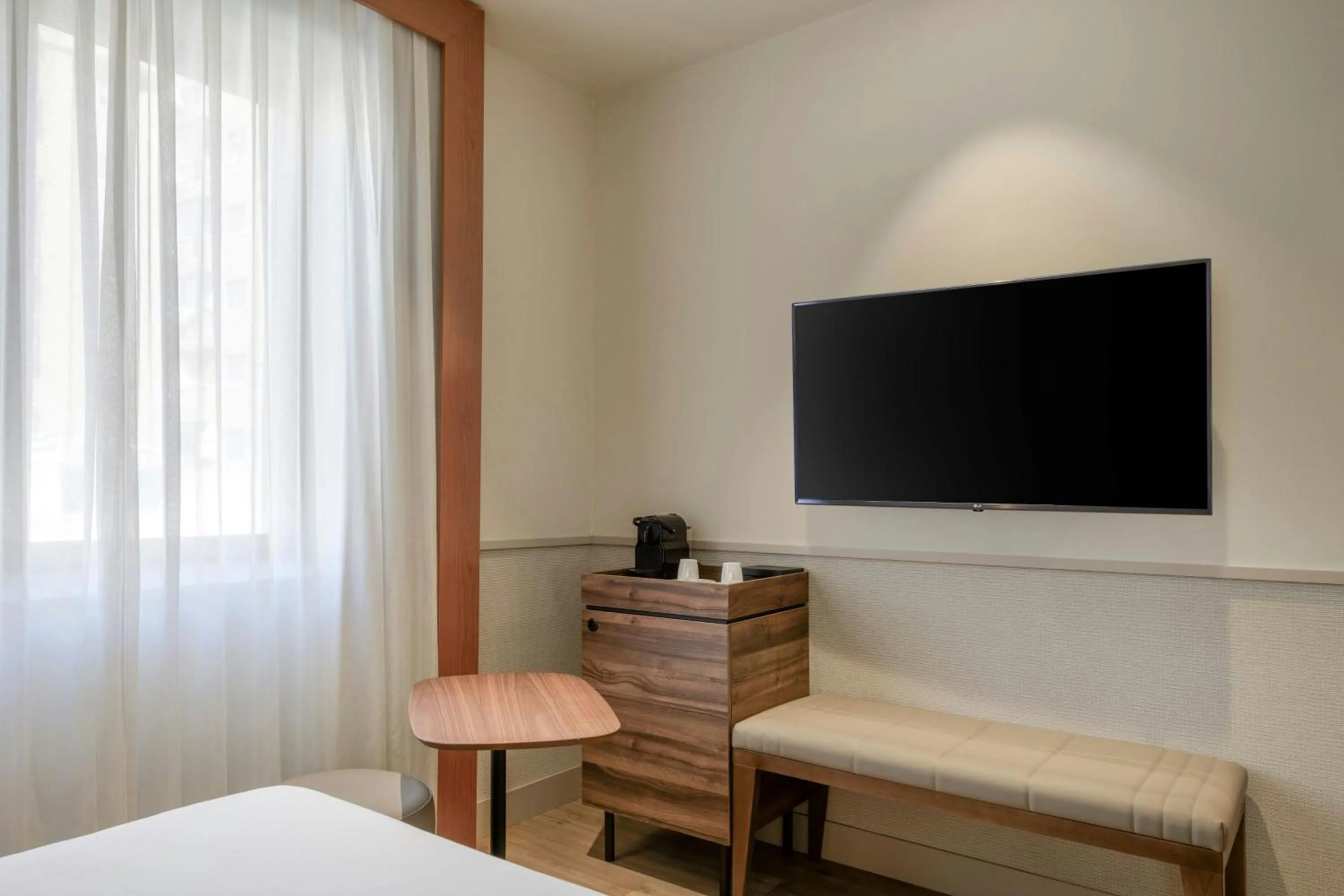 Photo of the whole room, Bed in AC Hotel Los Vascos by Marriott