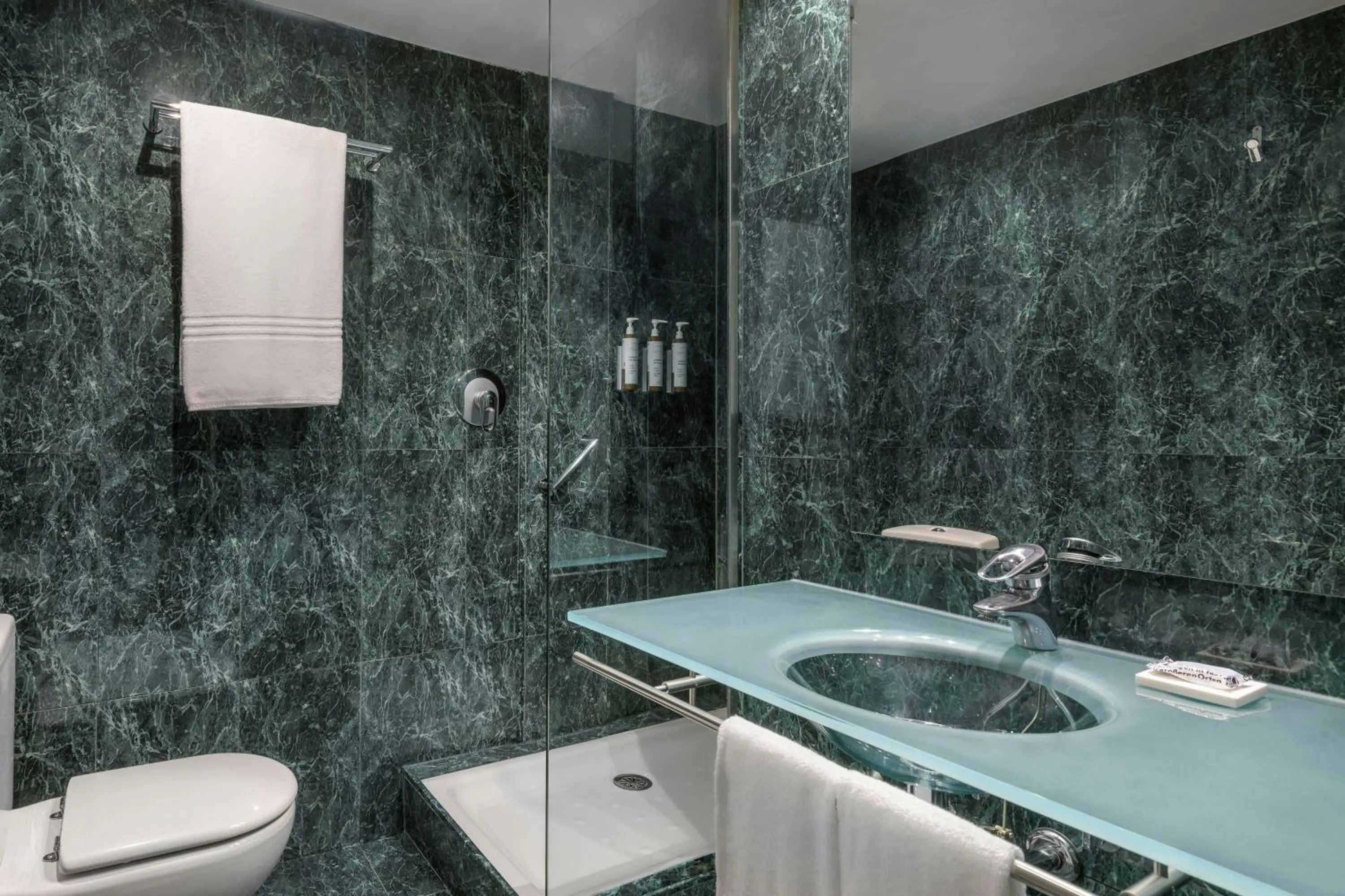 Bathroom in AC Hotel Los Vascos by Marriott