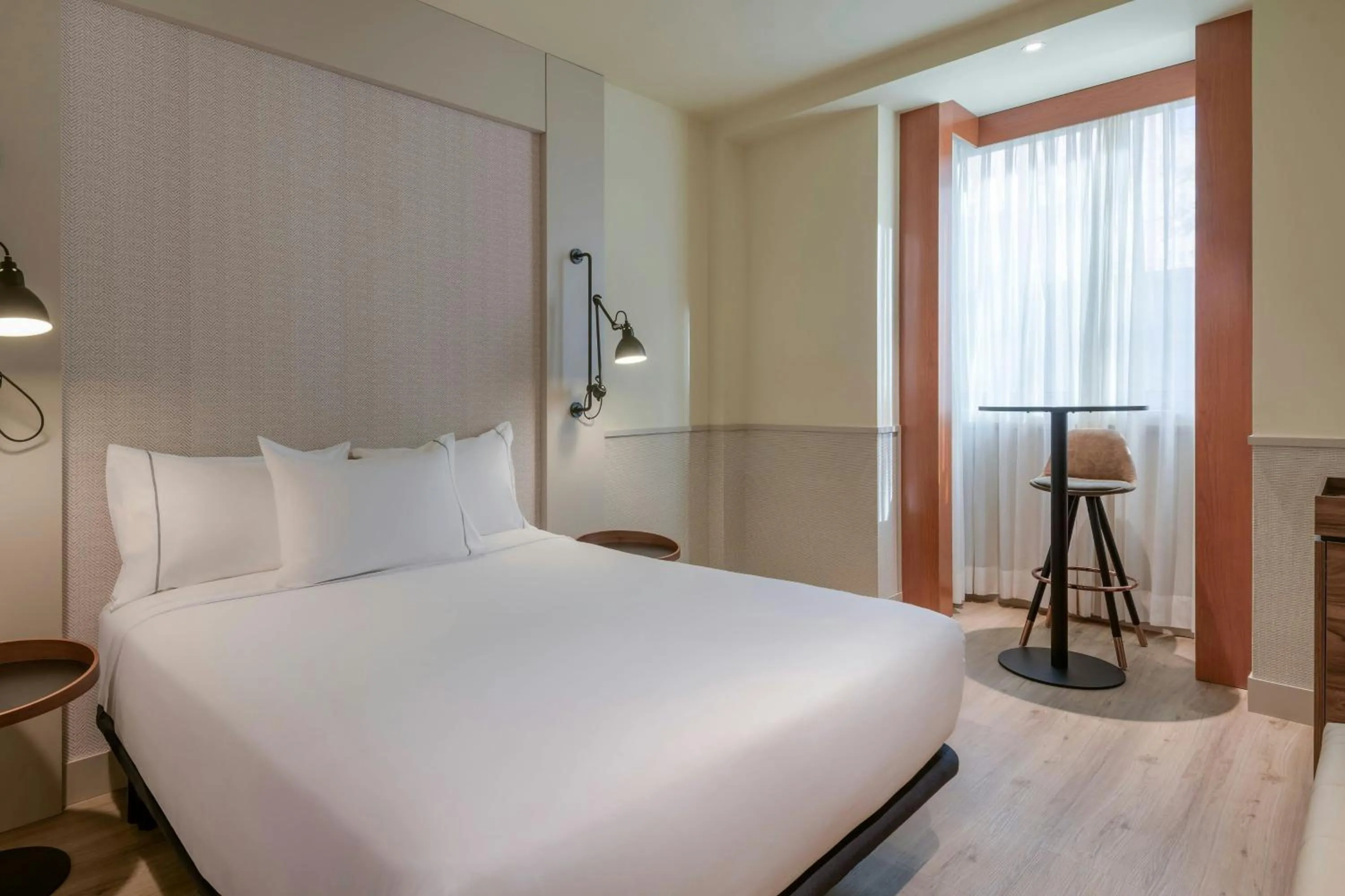 Photo of the whole room, Bed in AC Hotel Los Vascos by Marriott