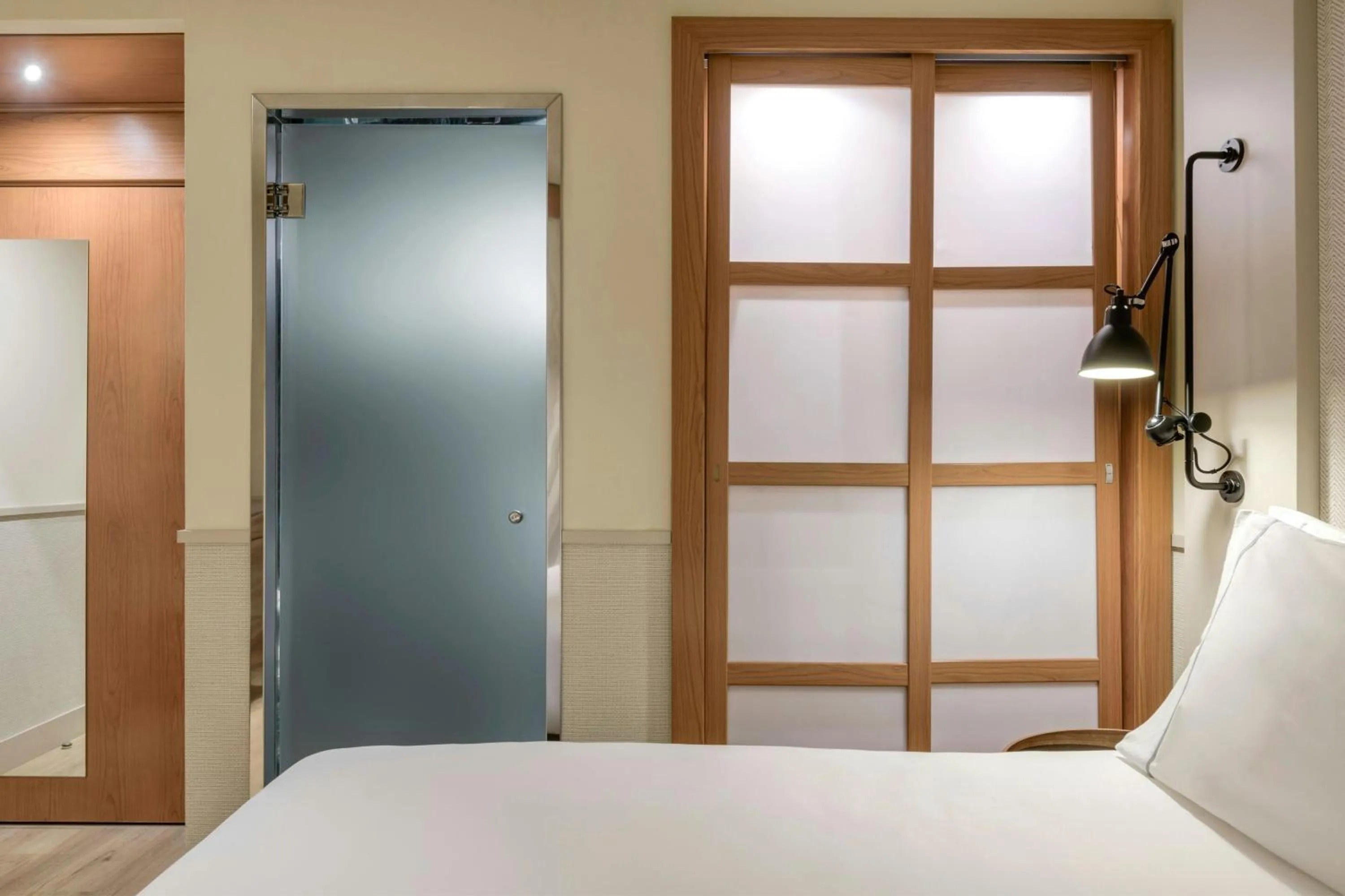 Photo of the whole room, Bed in AC Hotel Los Vascos by Marriott