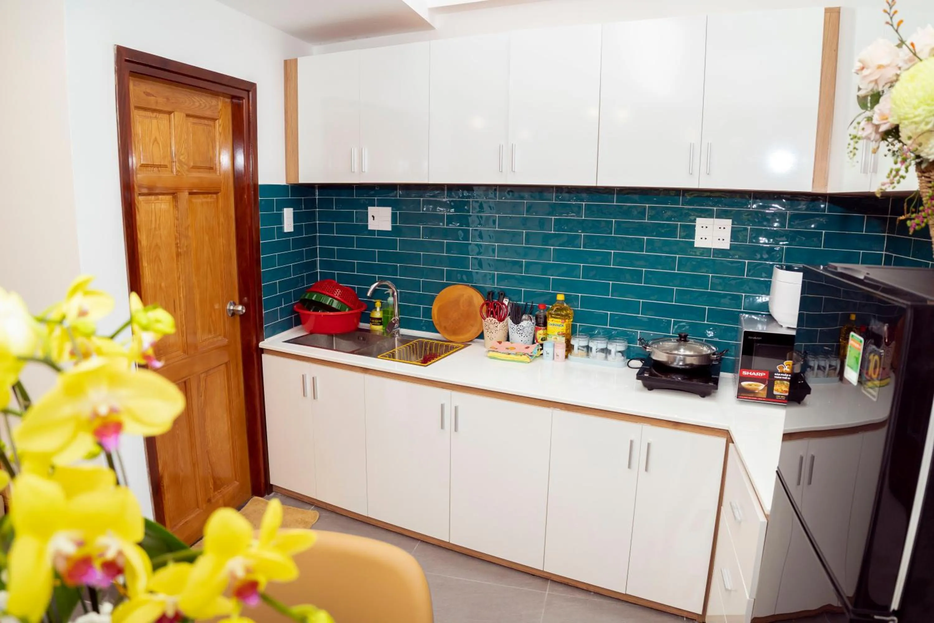 Kitchen or kitchenette in Mai Hotel