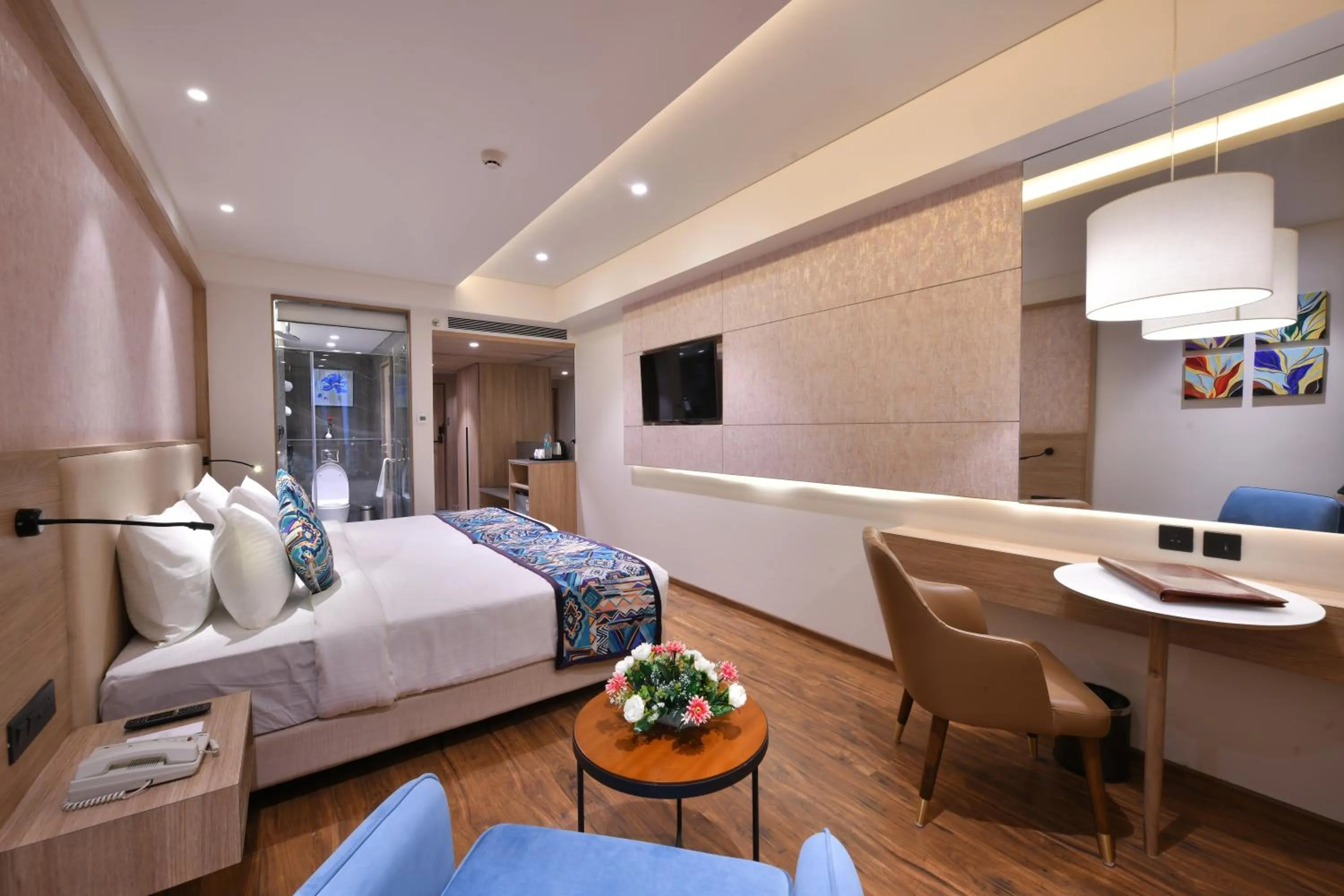 Photo of the whole room, Bed in Regenta Fairlark Vadodara