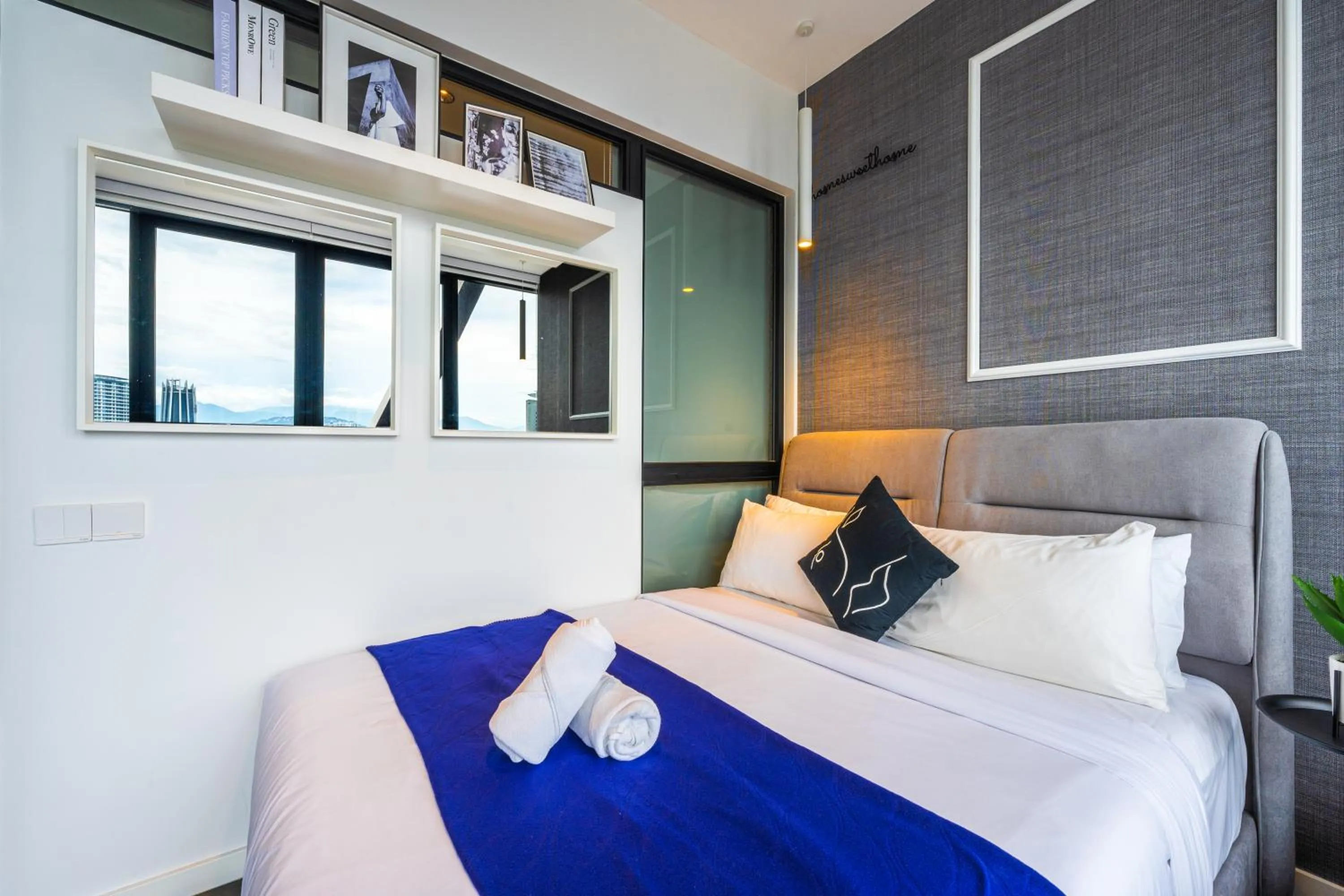 Bed in Greystone Scarletz Suites