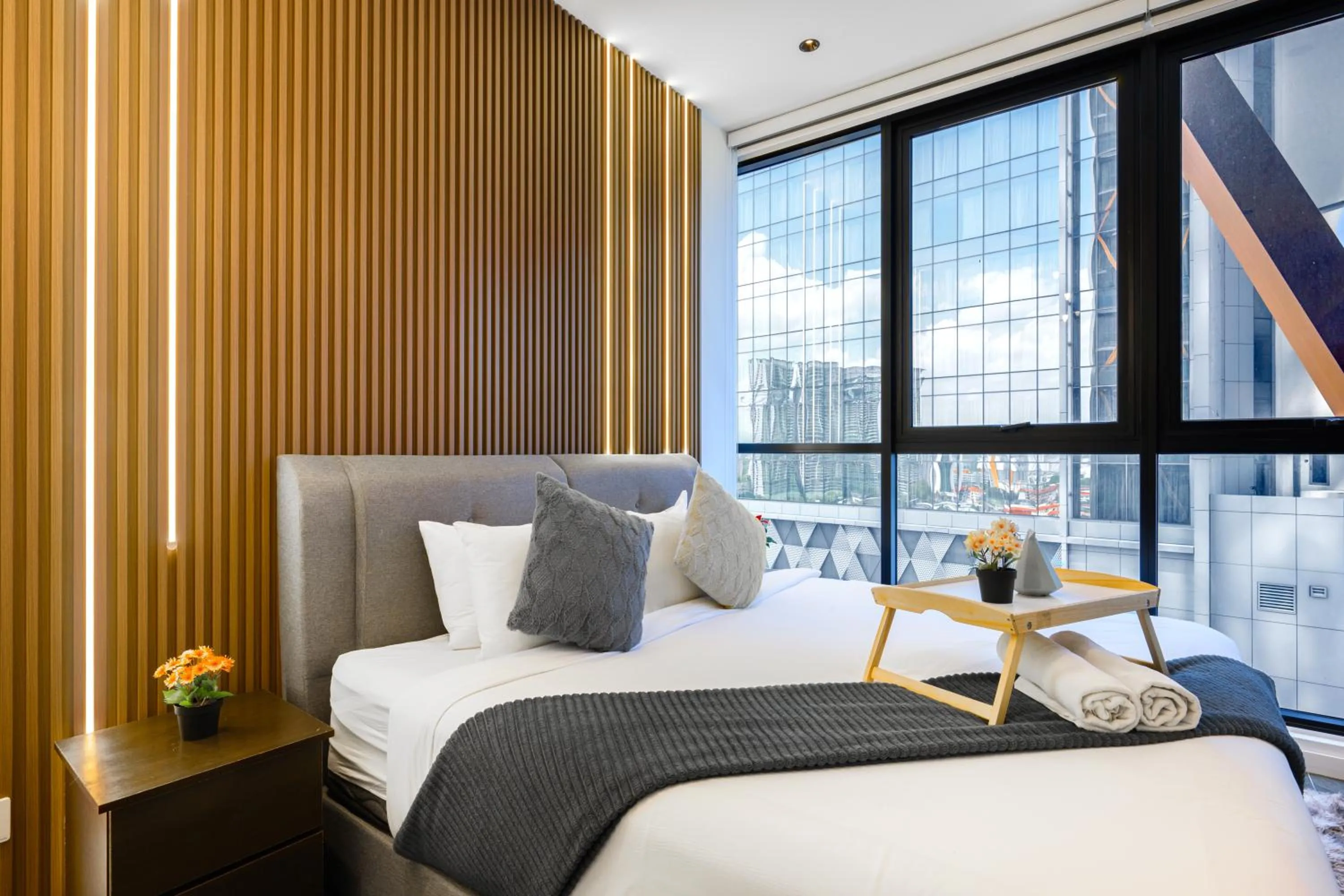 Bed in Greystone Scarletz Suites