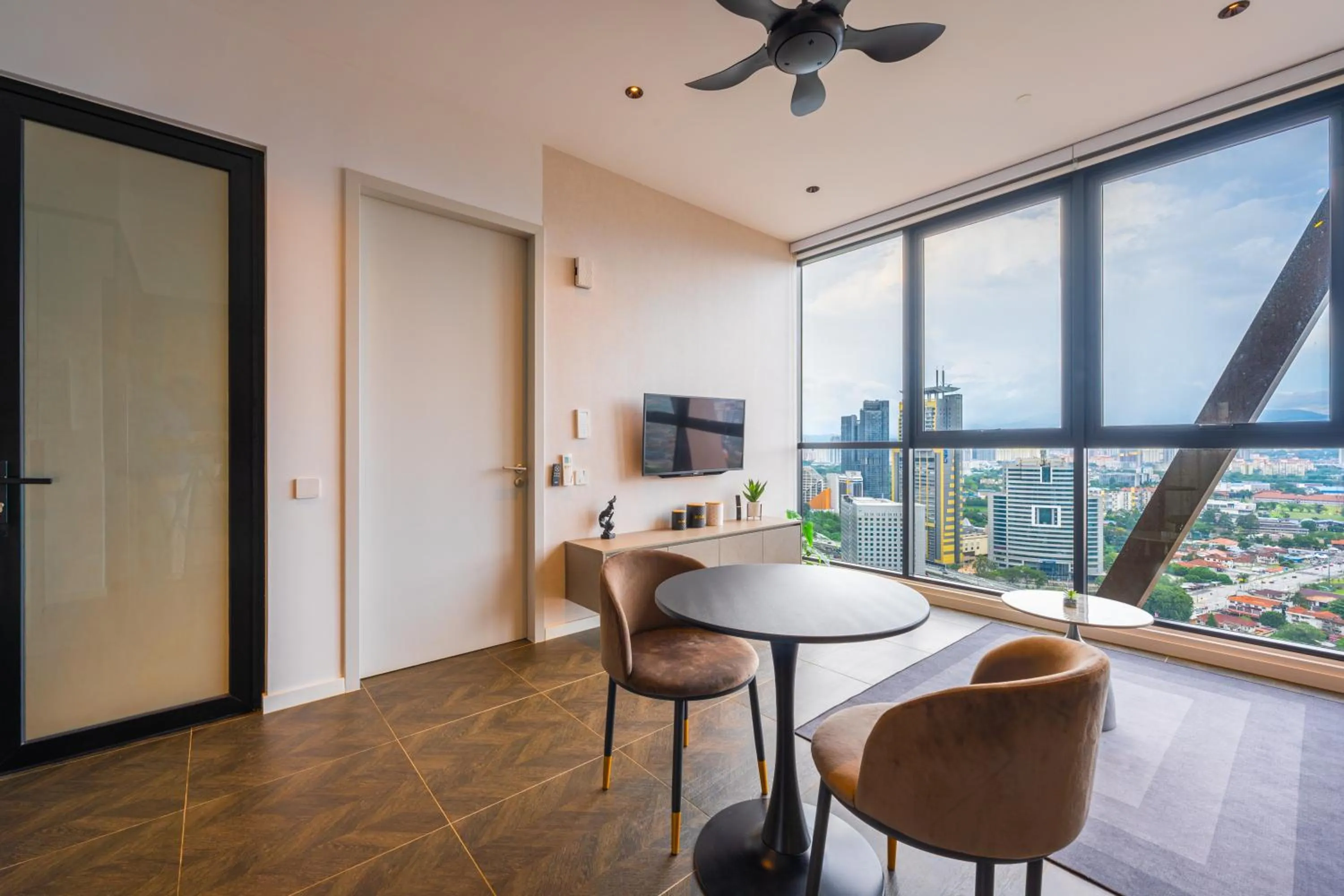 Living room in Greystone Scarletz Suites