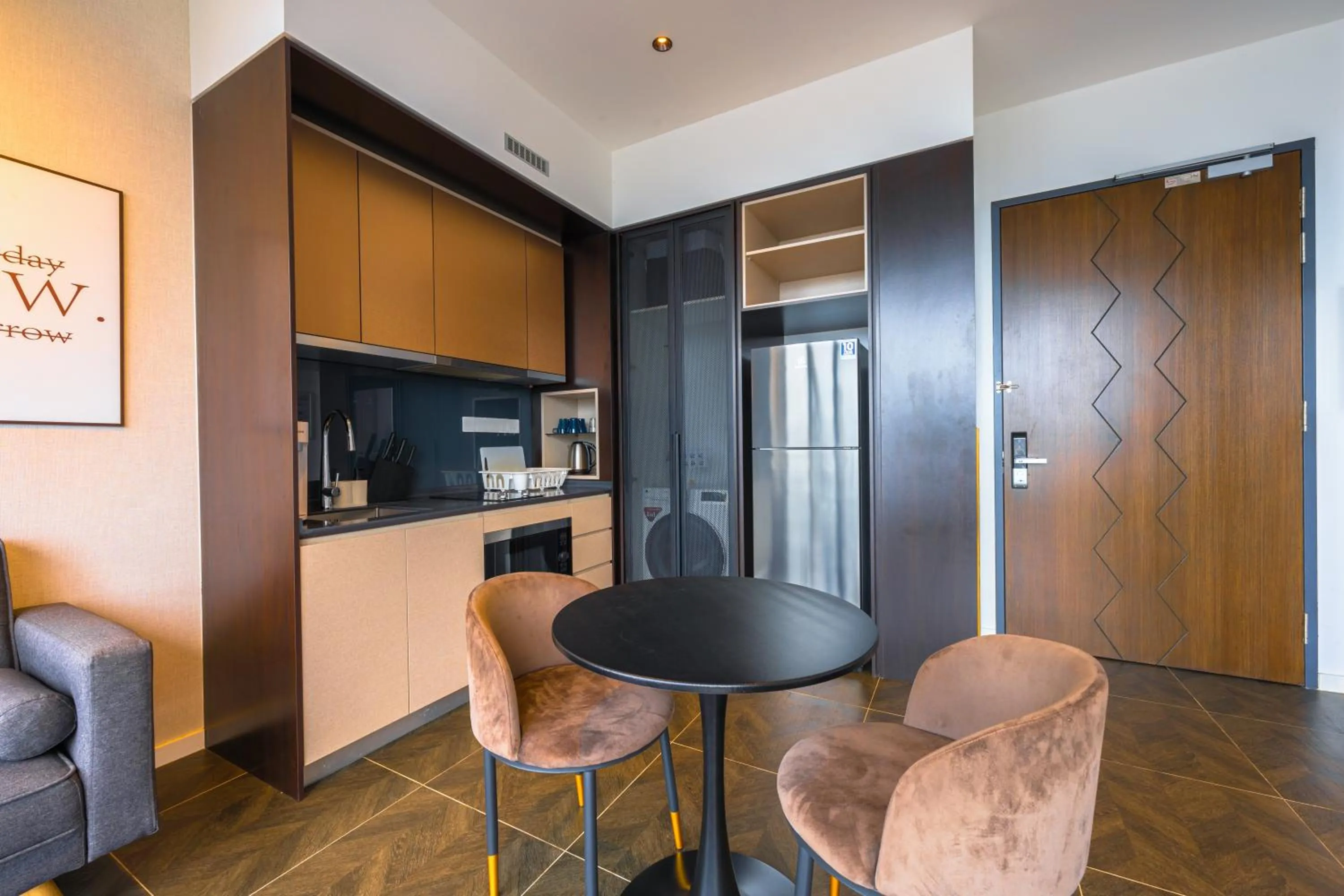 Kitchen or kitchenette in Greystone Scarletz Suites