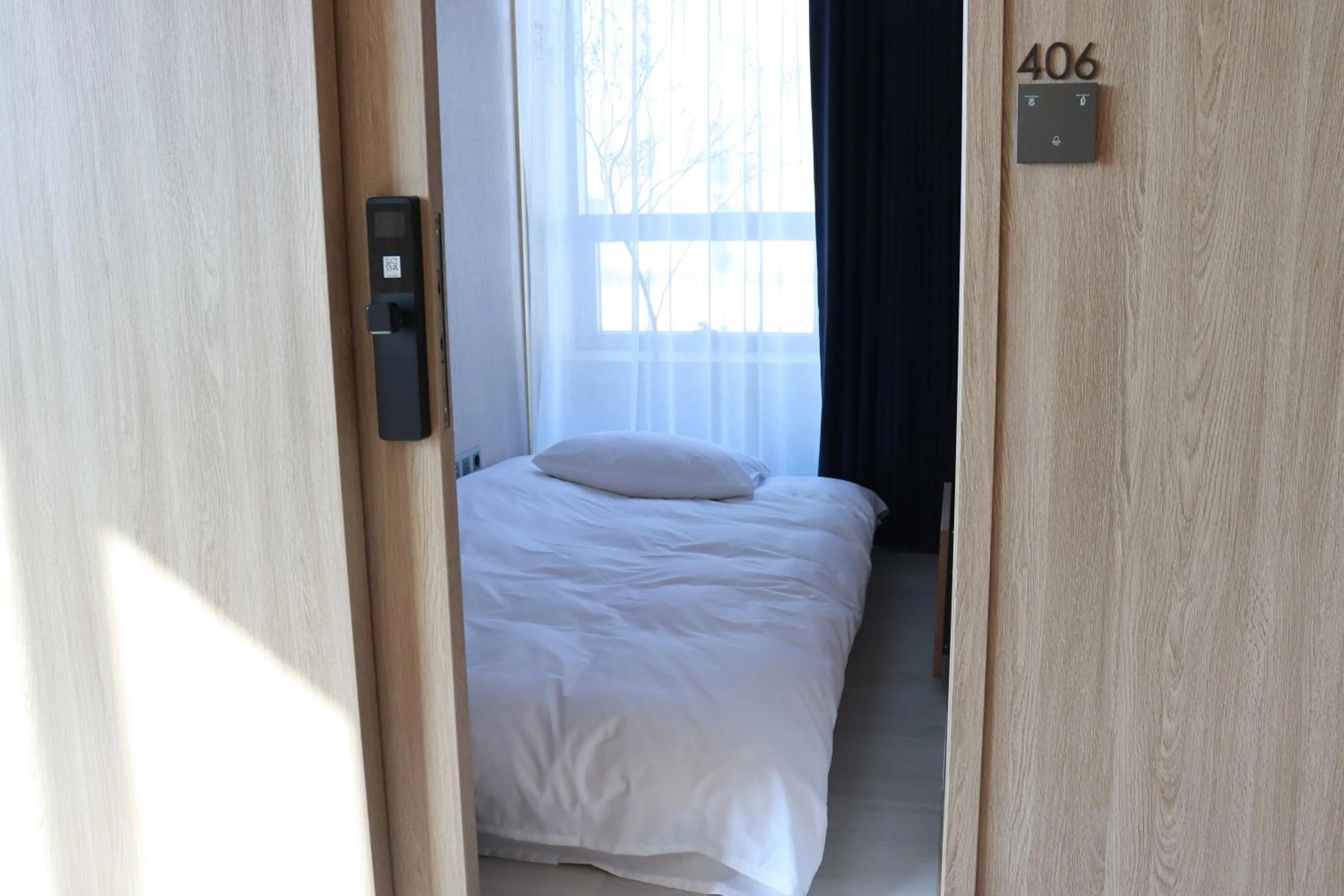 Bed in Hotel tt Gupo