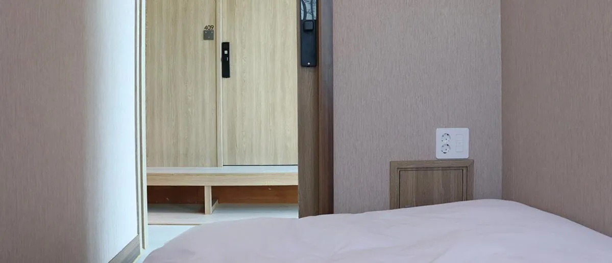 Bed in Hotel tt Gupo