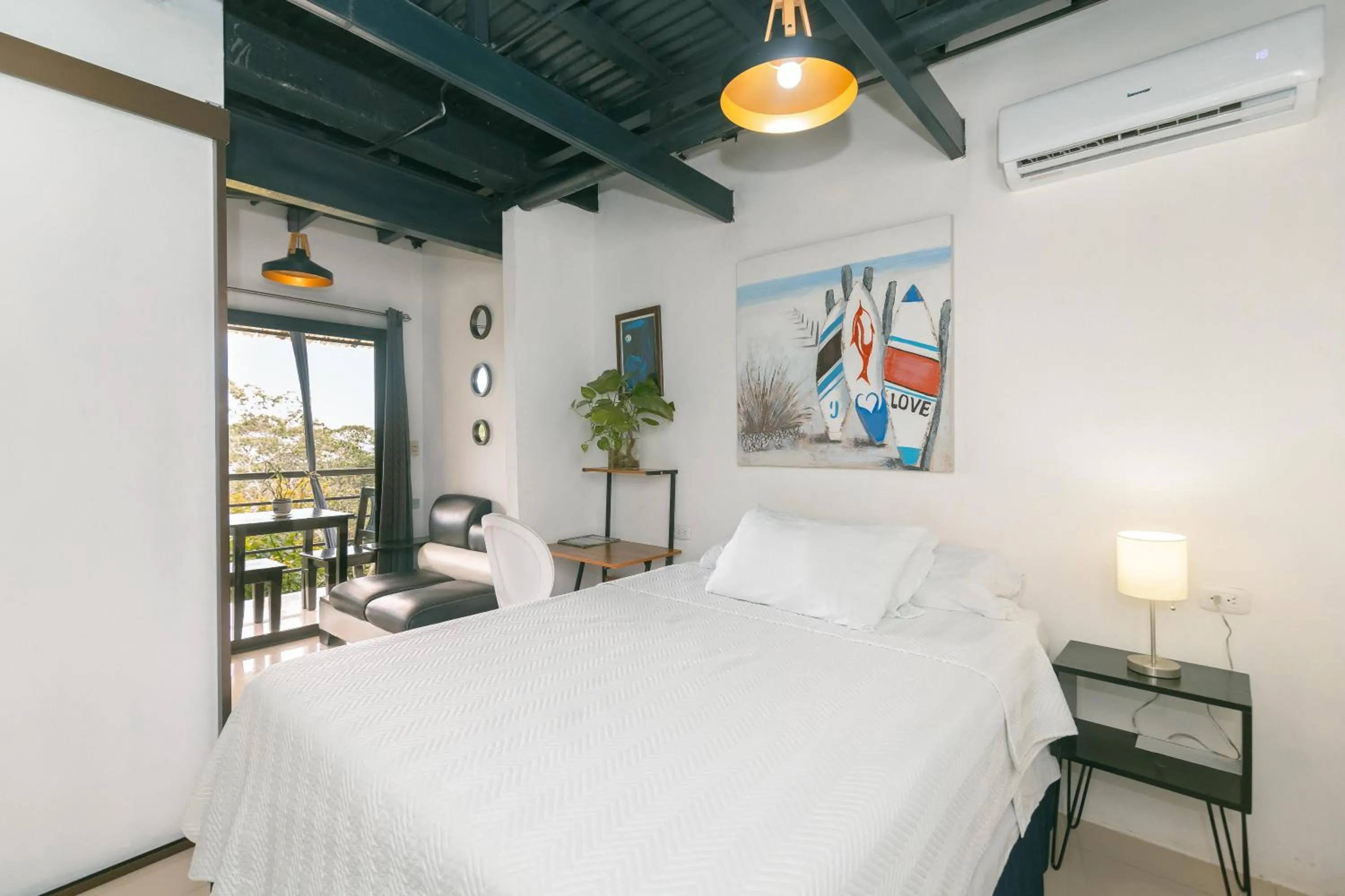 Bed in Vista del Pacifico Boutique Hotel