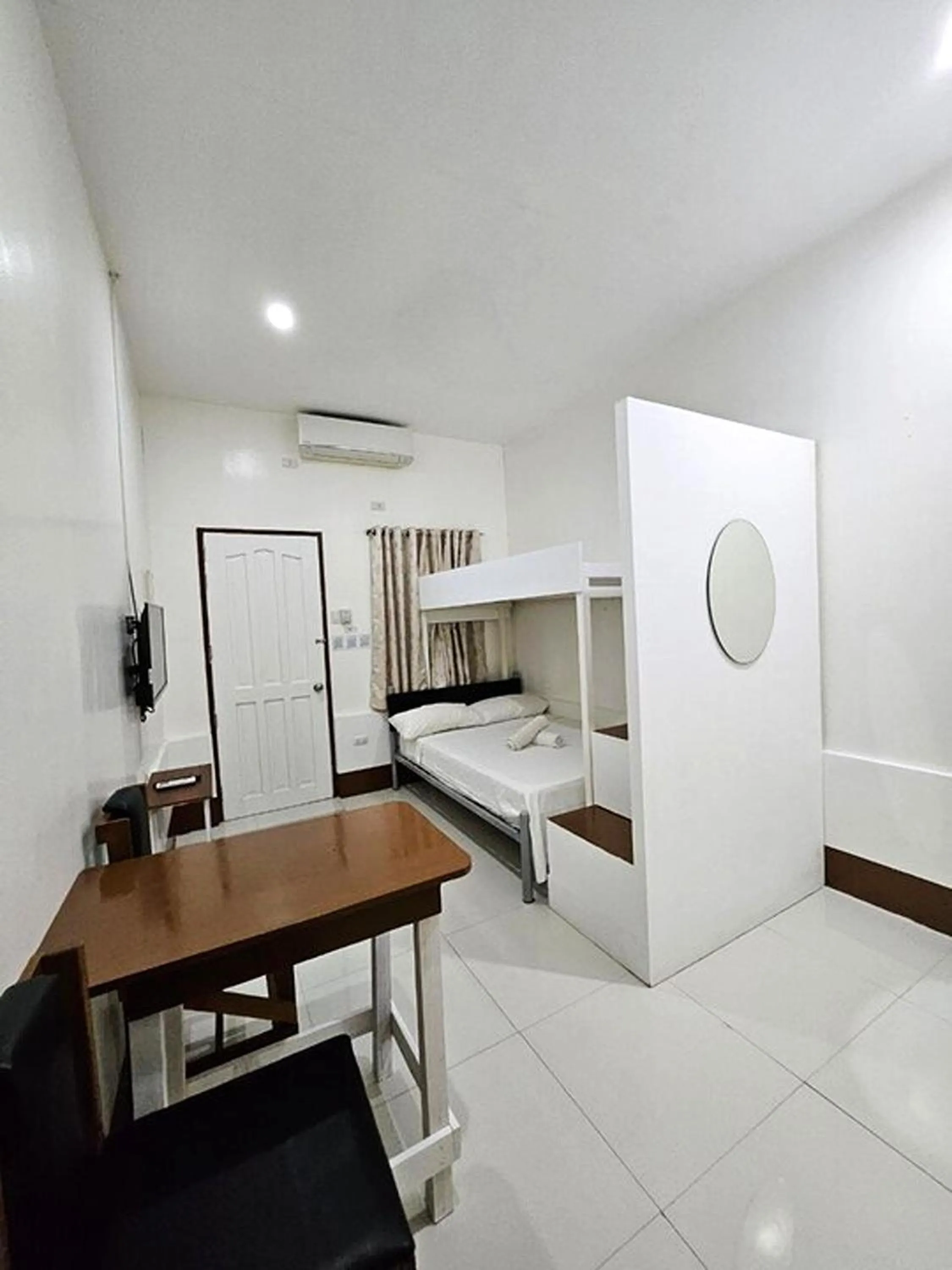 Bed in Palajuanders Inn Palawan