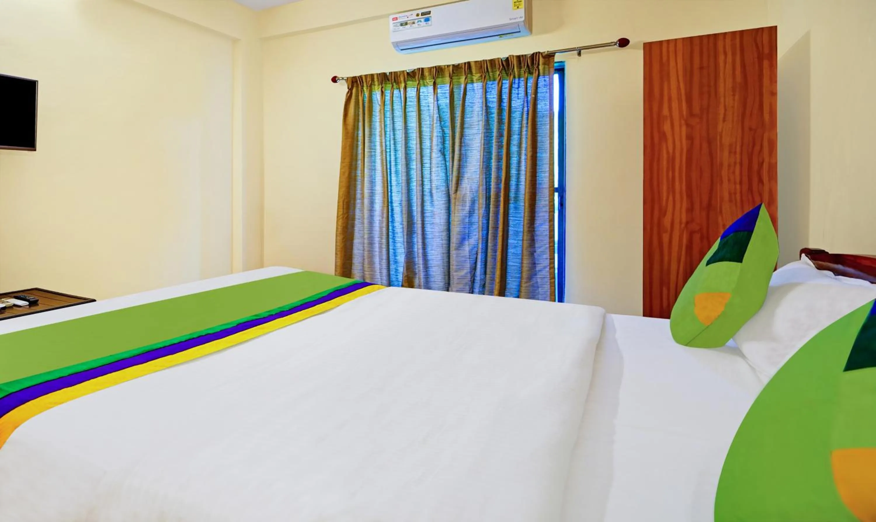 Bedroom, Bed in Treebo SS Residency With Mountain View