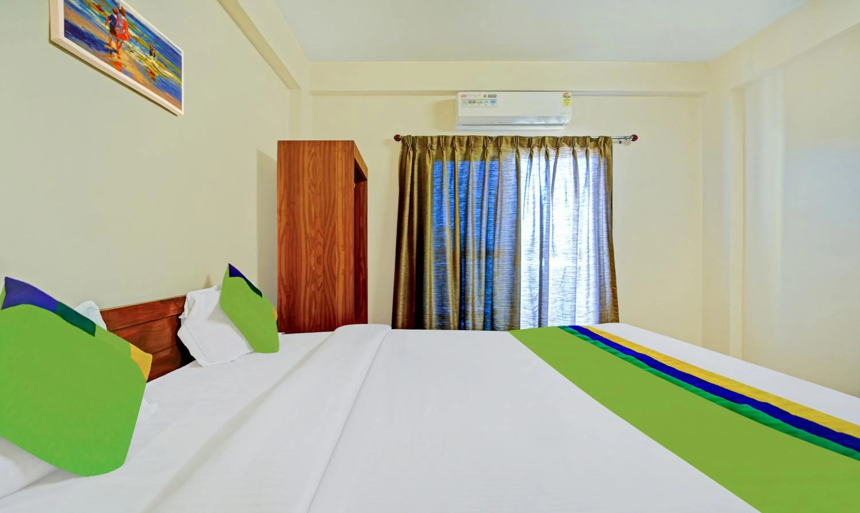 Bedroom, Bed in Treebo SS Residency With Mountain View