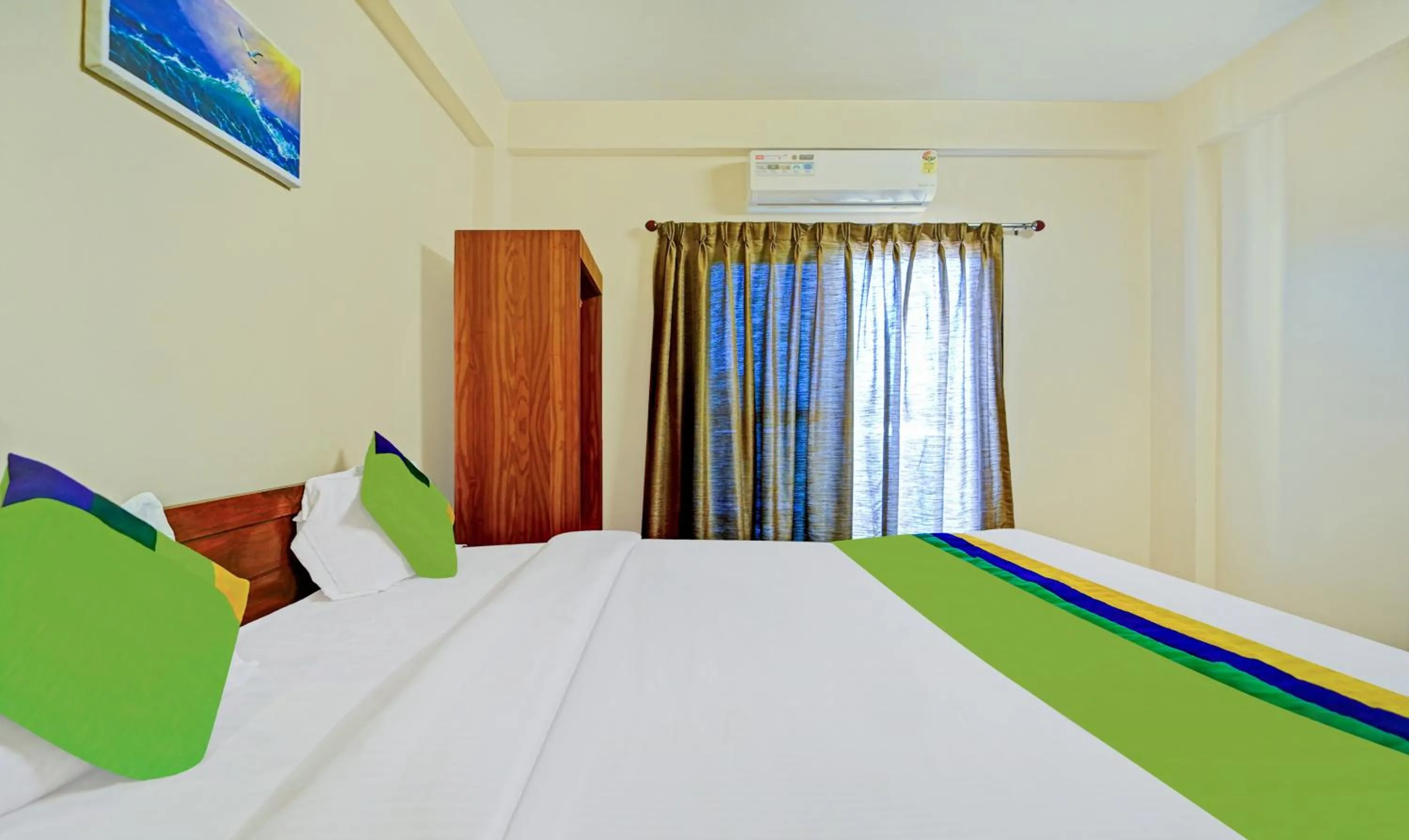 Bedroom, Bed in Treebo SS Residency With Mountain View