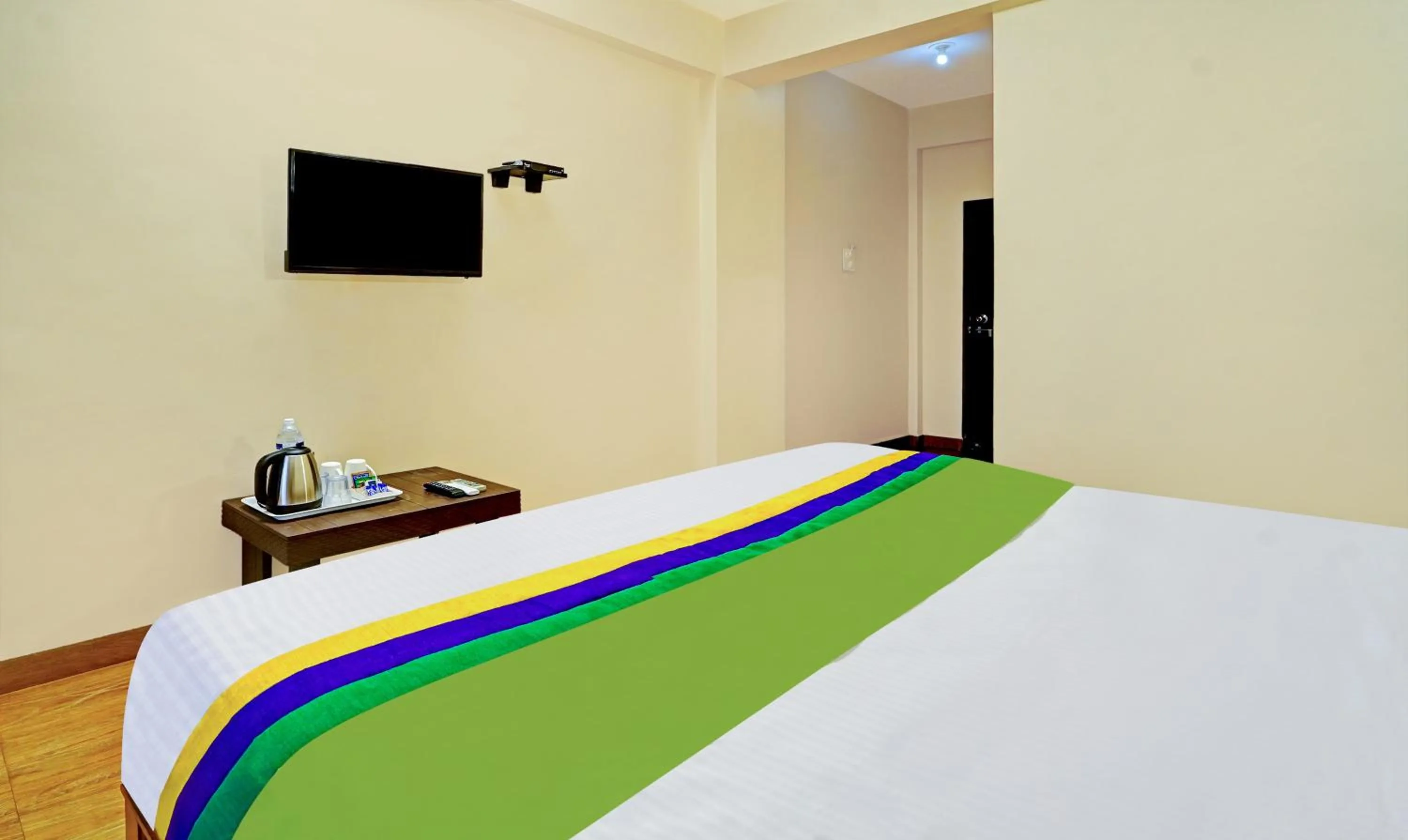 Bedroom, Bed in Treebo SS Residency With Mountain View