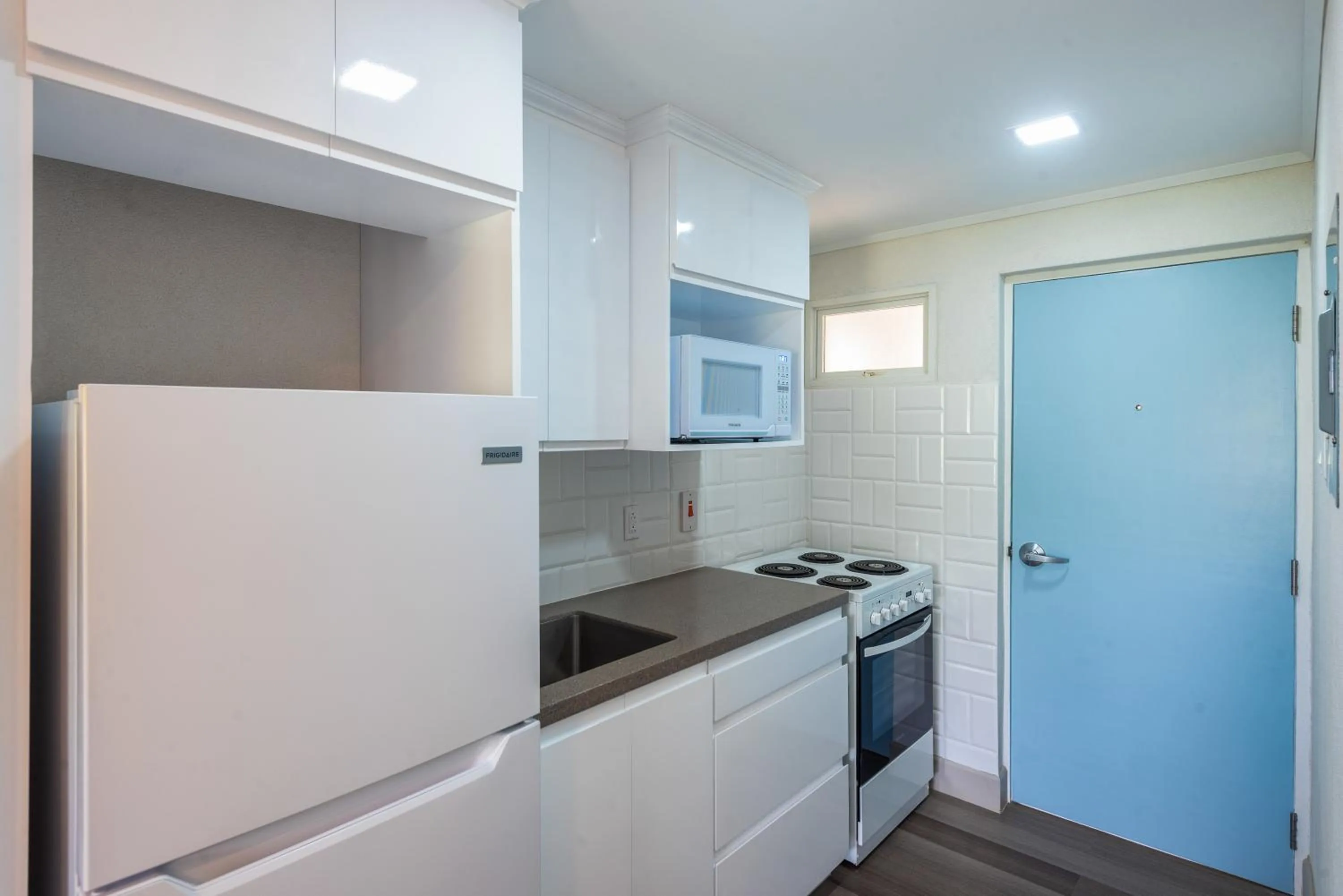 Kitchen or kitchenette in Blue Haven Holiday Apartments