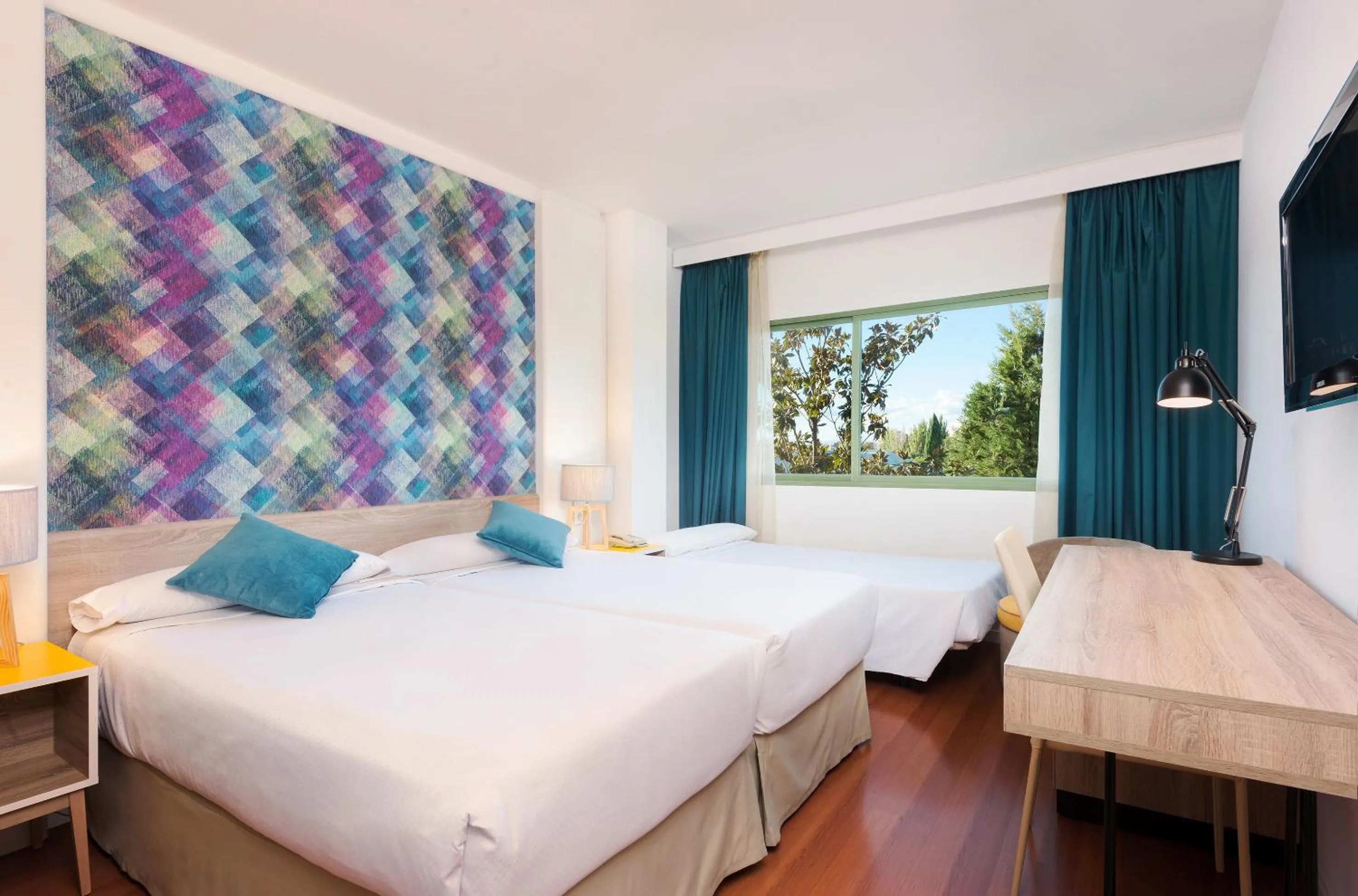 Photo of the whole room, Bed in Hotel Guadalajara & Conference Center Affiliated by Meliá