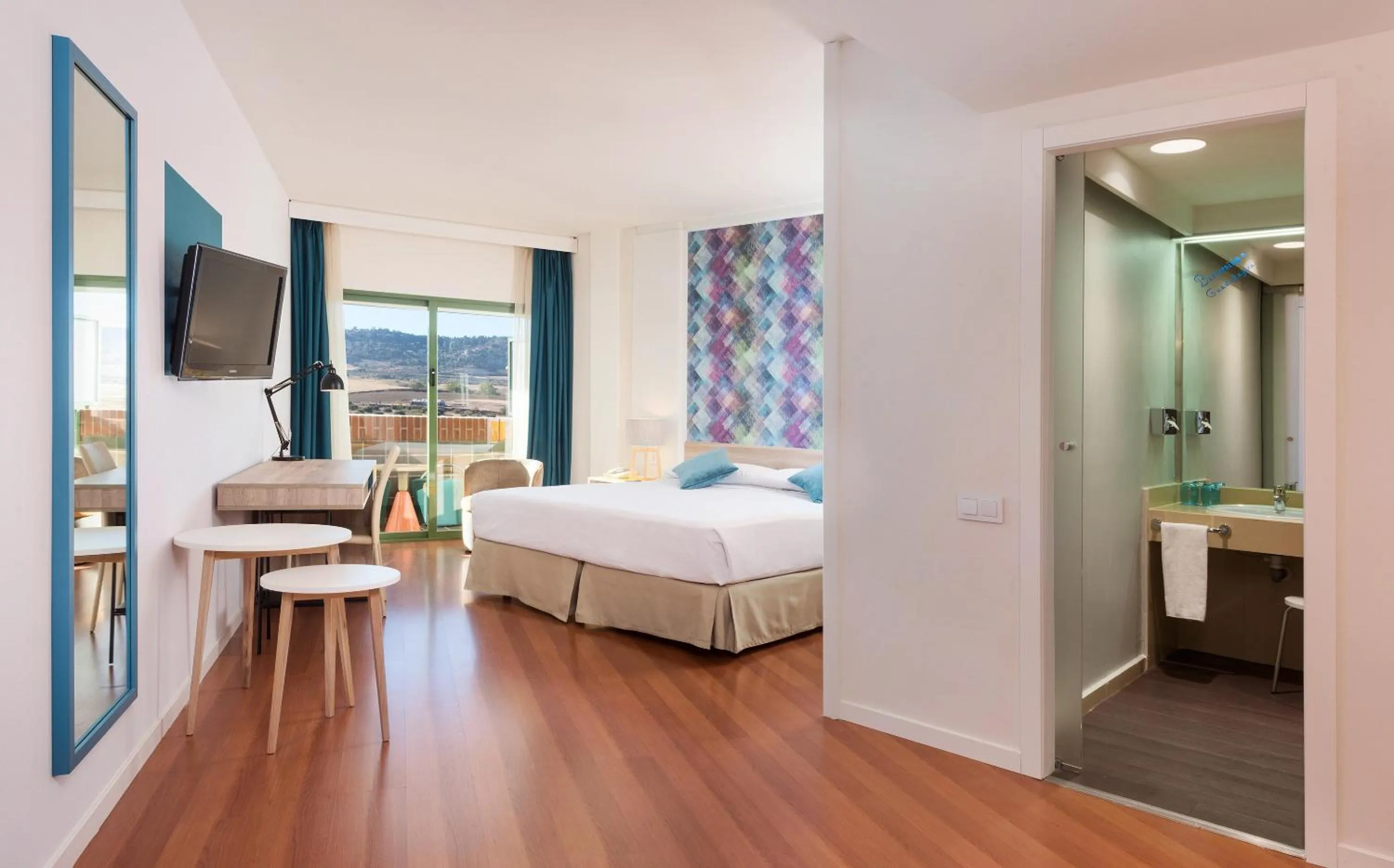 Photo of the whole room, Bed in Hotel Guadalajara & Conference Center Affiliated by Meliá