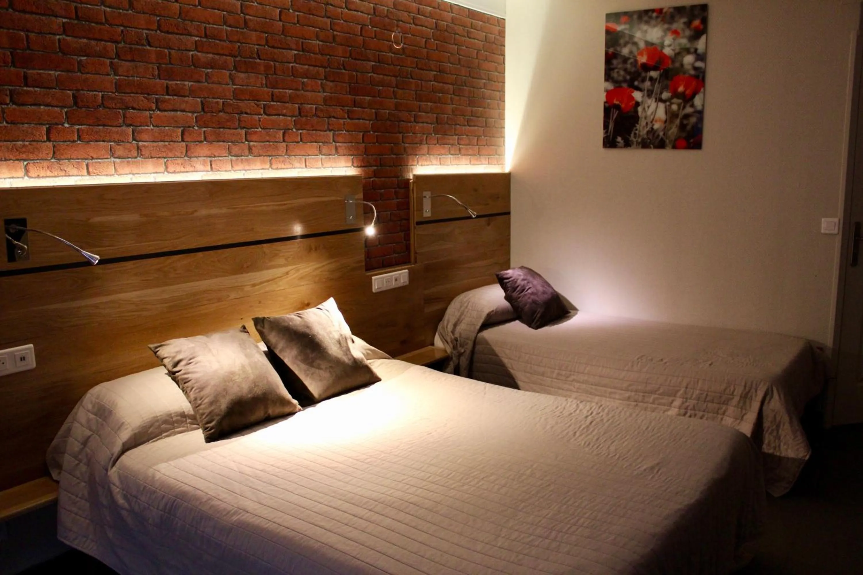 Bed in Hotel des Pyrénées