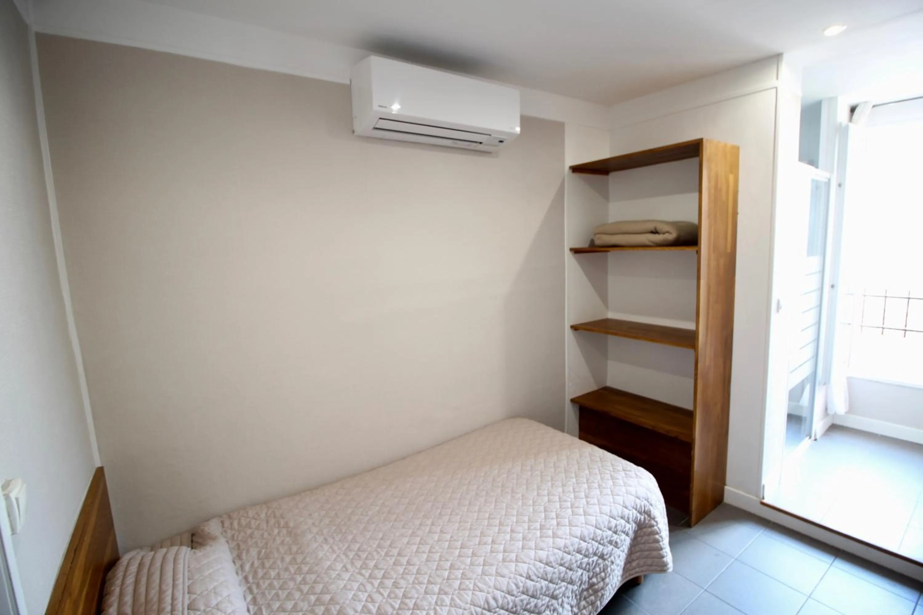 Bed in Hotel des Pyrénées