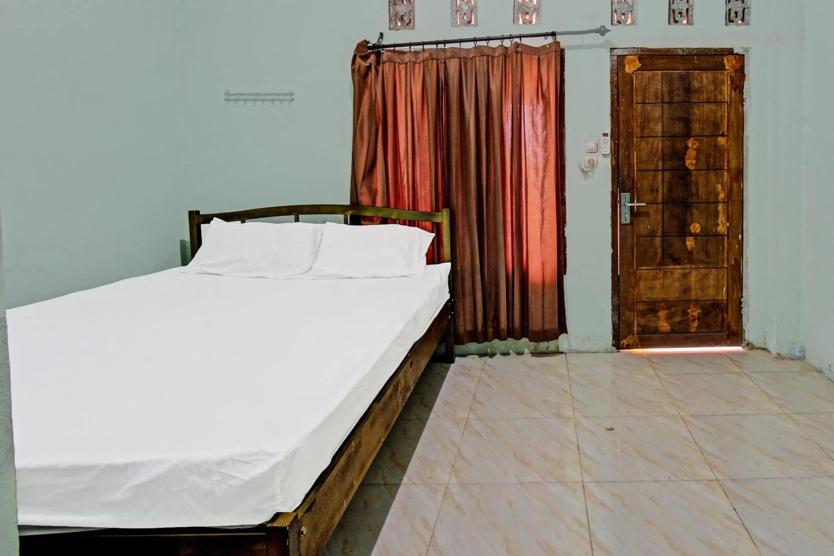 Bedroom, Bed in Hotel O Homestay Bang HajiNearLapangan Penujak ( Inen Gonggang)
