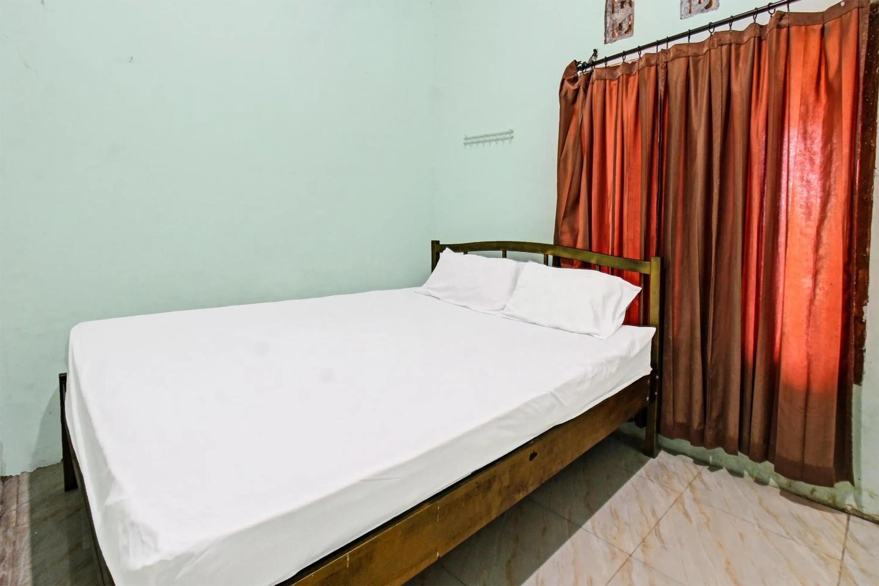 Bedroom, Bed in Hotel O Homestay Bang HajiNearLapangan Penujak ( Inen Gonggang)