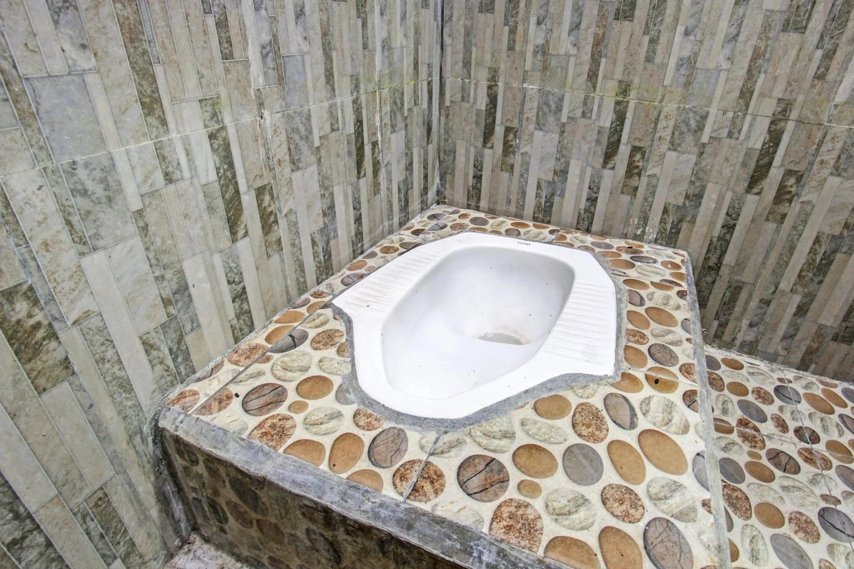 Bathroom in Hotel O Homestay Bang HajiNearLapangan Penujak ( Inen Gonggang)