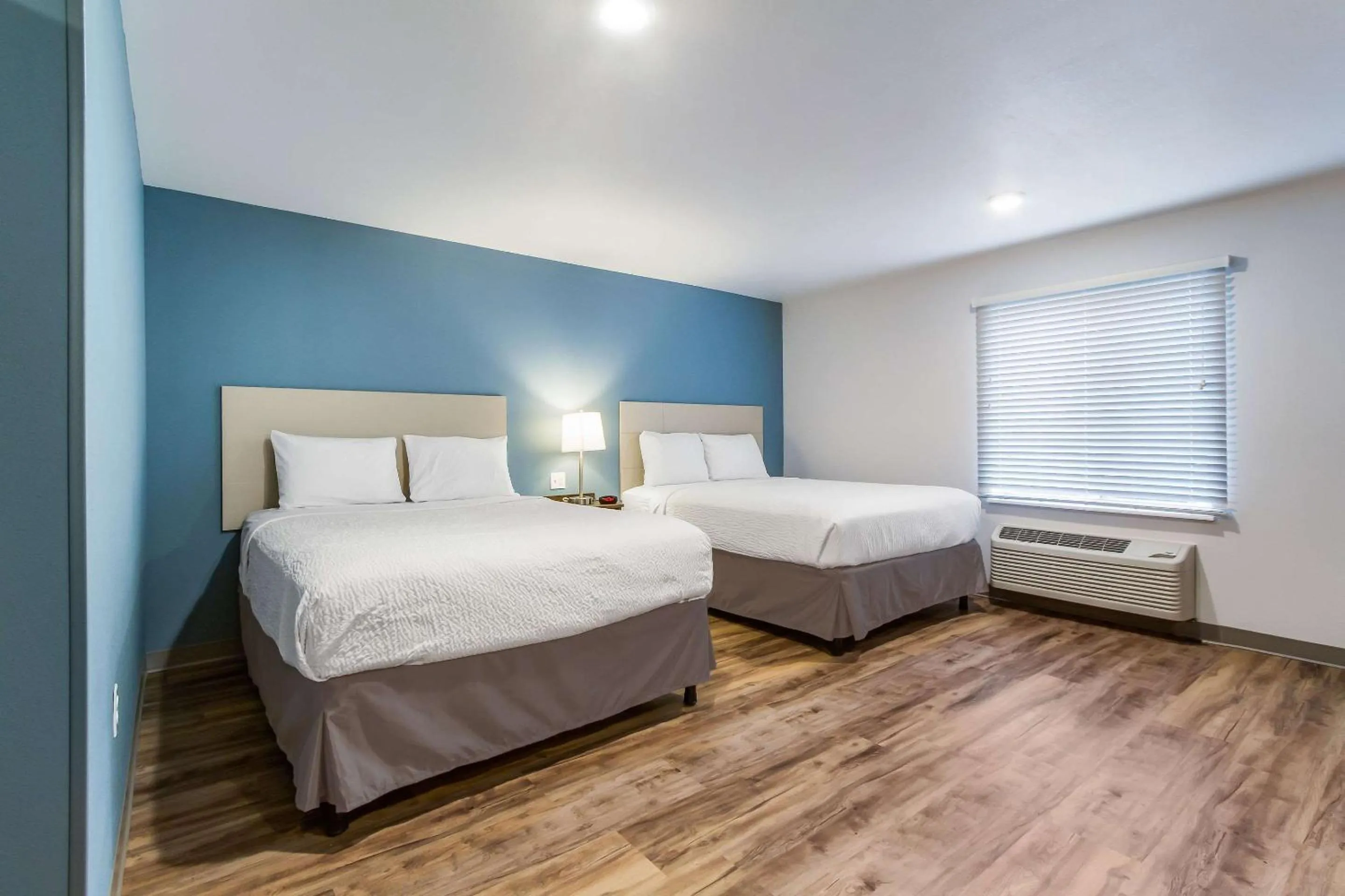 Bedroom, Bed in WoodSpring Suites Harrisburg Linglestown