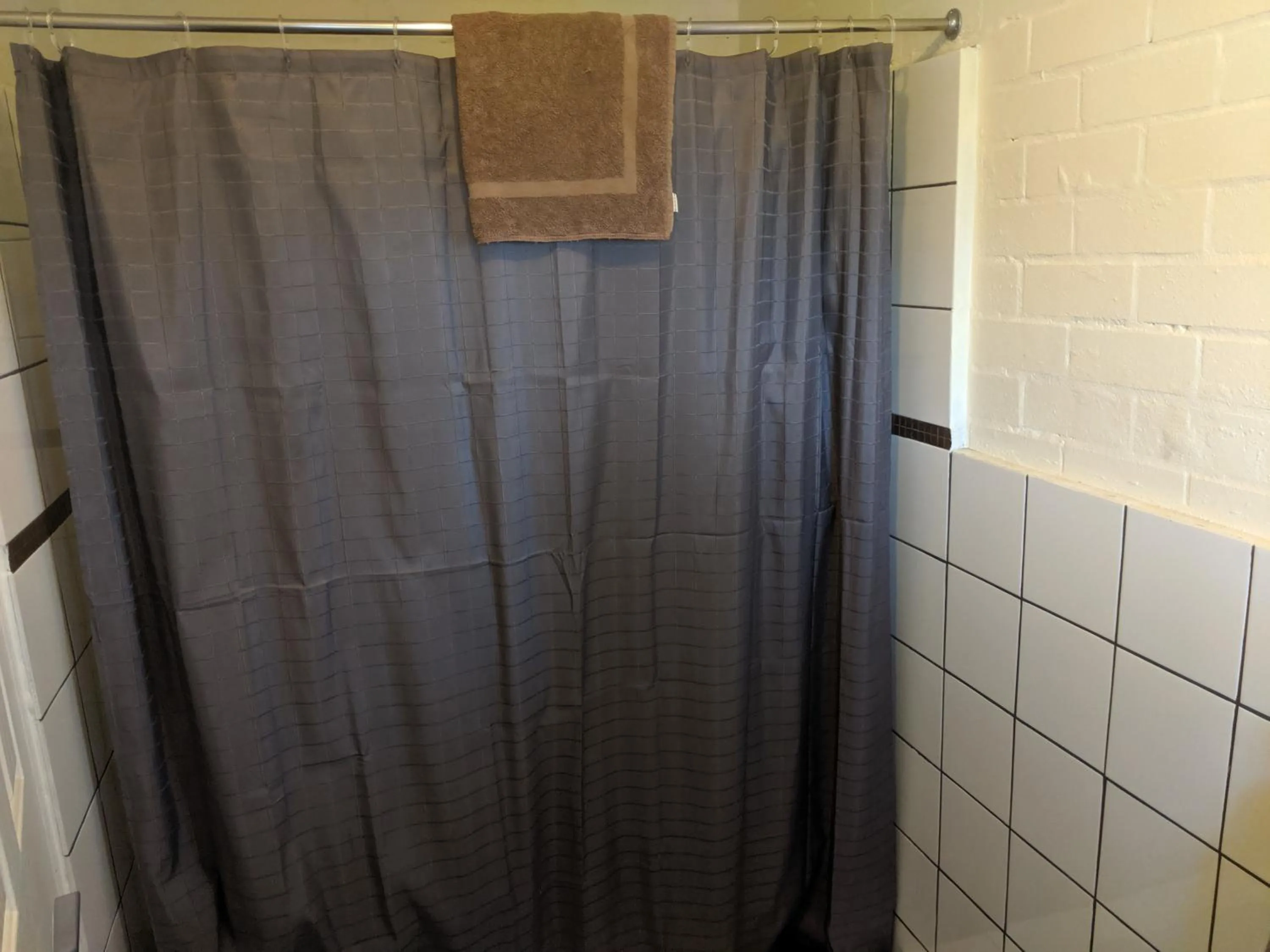 Bathroom in Harrington Village Motel