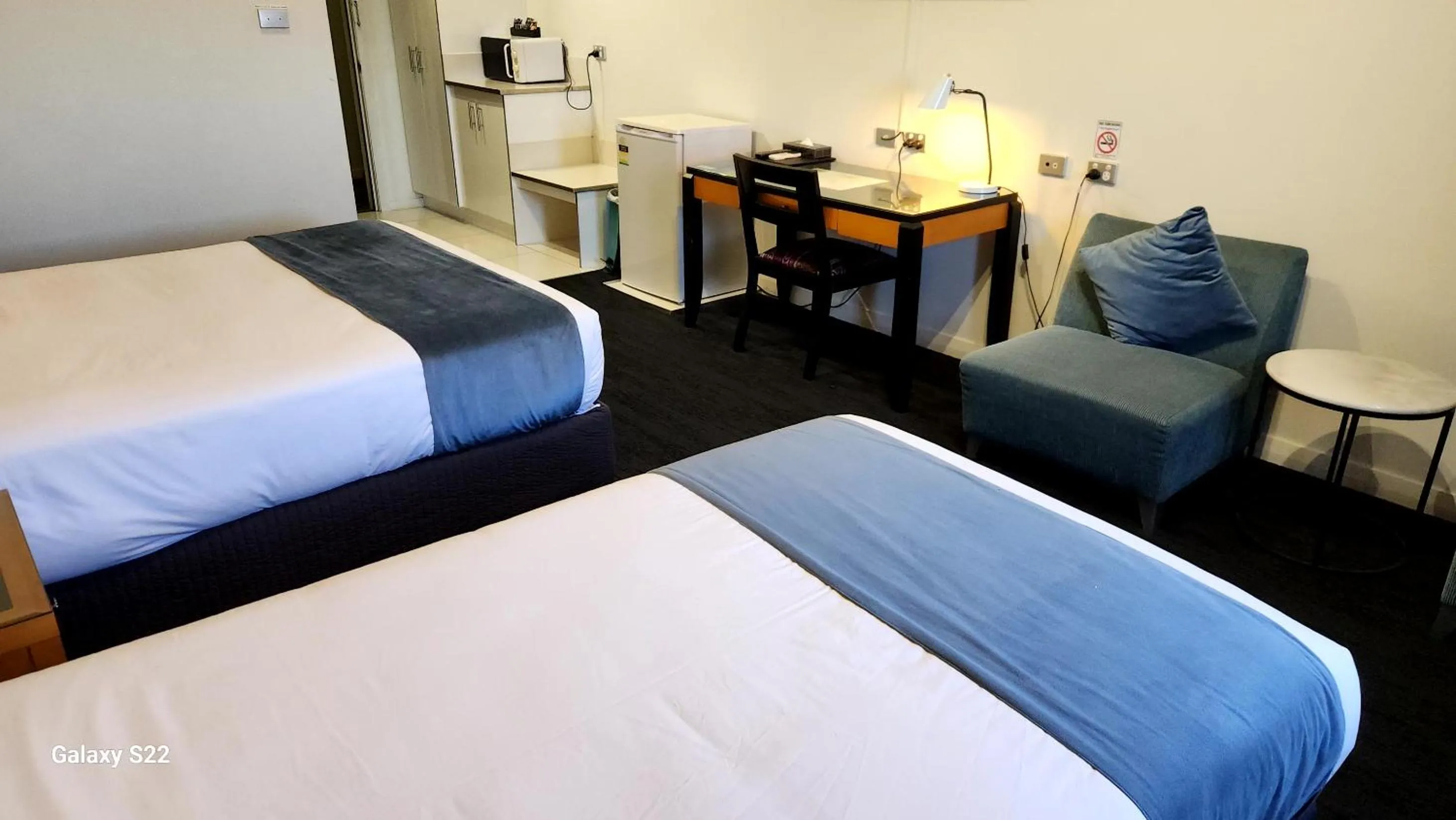 Bed in The Grand Motel